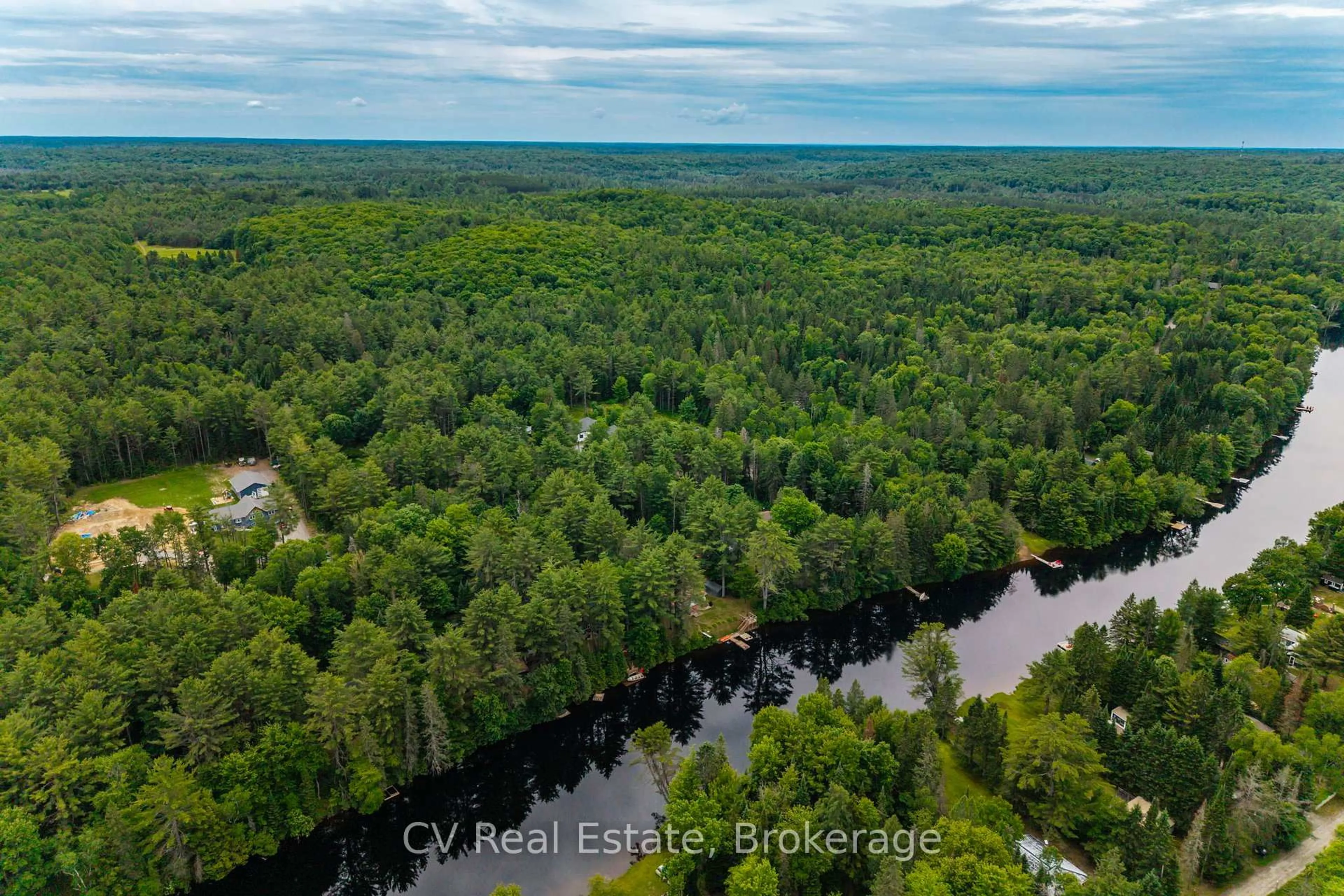 A pic from outside/outdoor area/front of a property/back of a property/a pic from drone, water/lake/river/ocean view for 546 Balsam Chutes Rd, Huntsville Ontario P0B 1L0