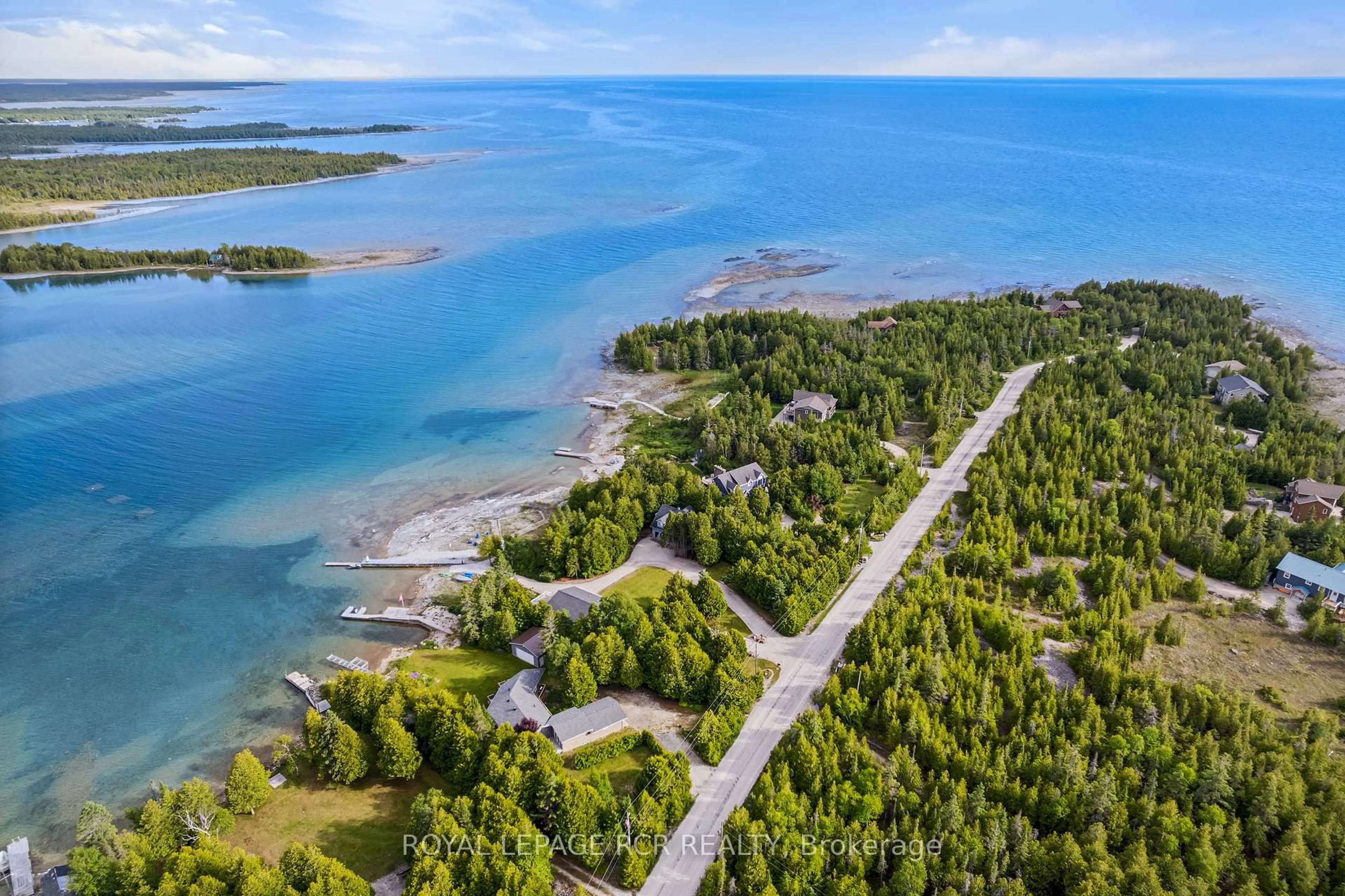A pic from outside/outdoor area/front of a property/back of a property/a pic from drone, water/lake/river/ocean view for 119 Pine Tree Harbour Rd, Northern Bruce Peninsula Ontario N0H 1Z0