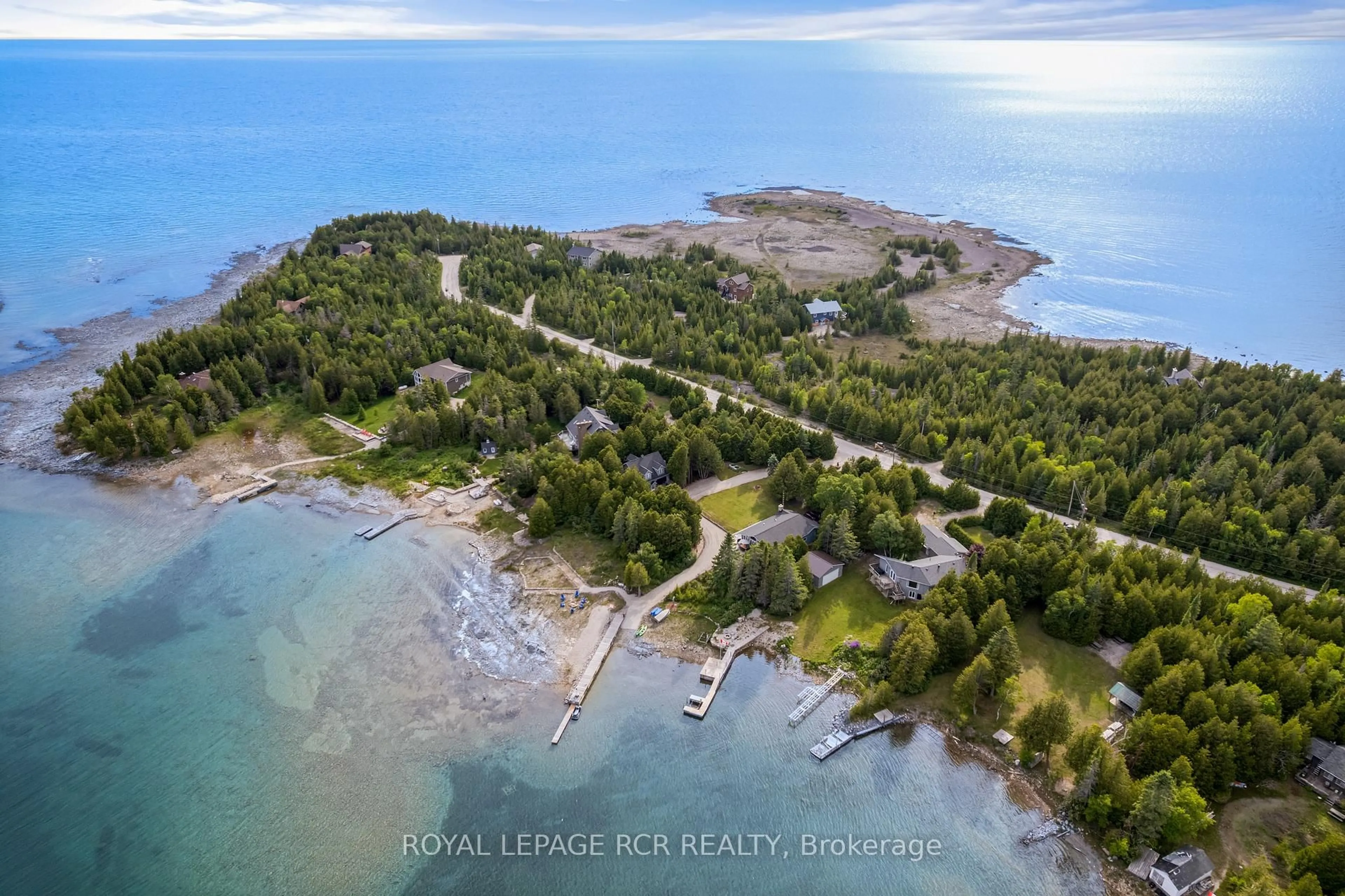 A pic from outside/outdoor area/front of a property/back of a property/a pic from drone, water/lake/river/ocean view for 119 Pine Tree Harbour Rd, Northern Bruce Peninsula Ontario N0H 1Z0