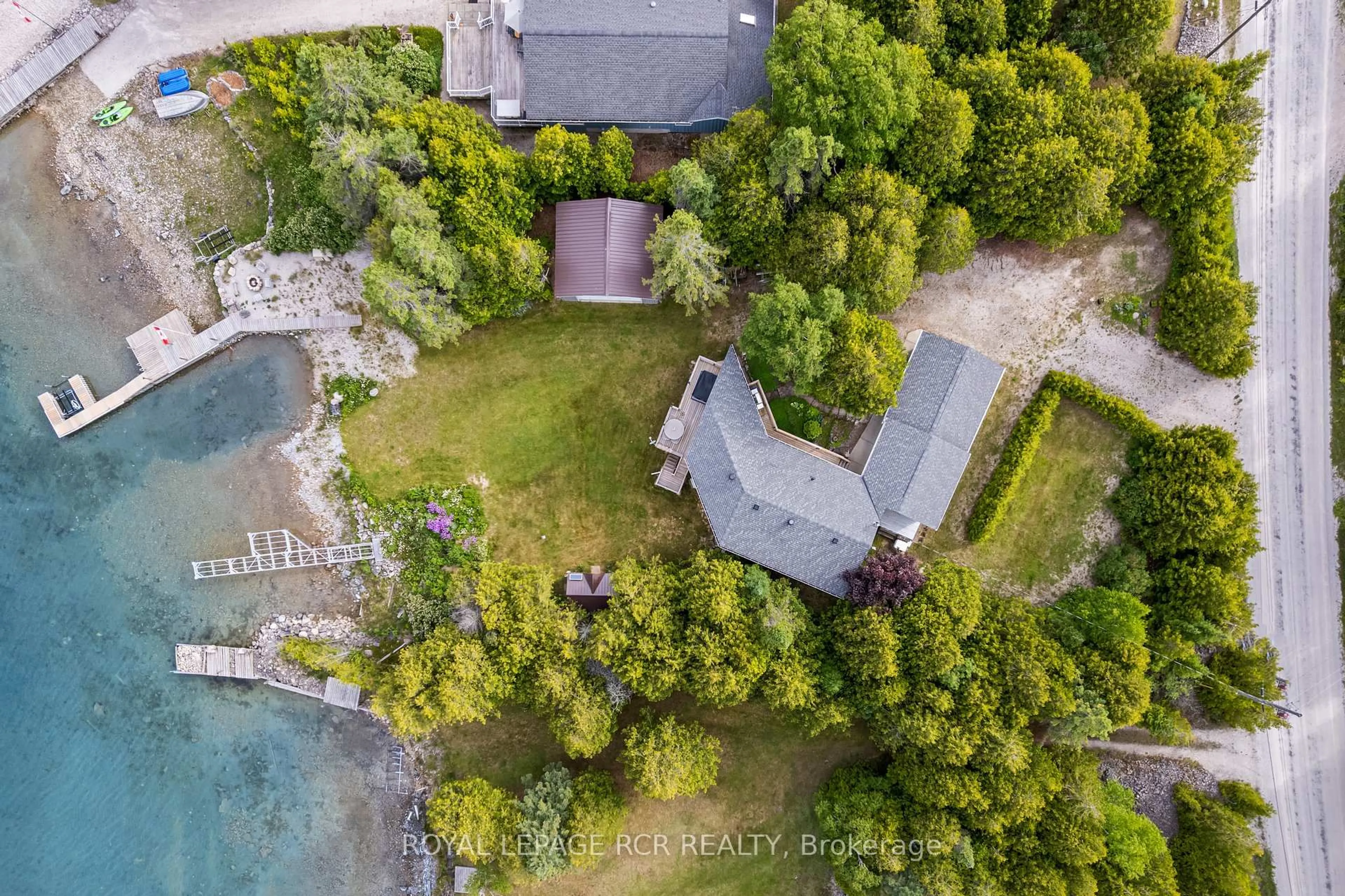 A pic from outside/outdoor area/front of a property/back of a property/a pic from drone, water/lake/river/ocean view for 119 Pine Tree Harbour Rd, Northern Bruce Peninsula Ontario N0H 1Z0