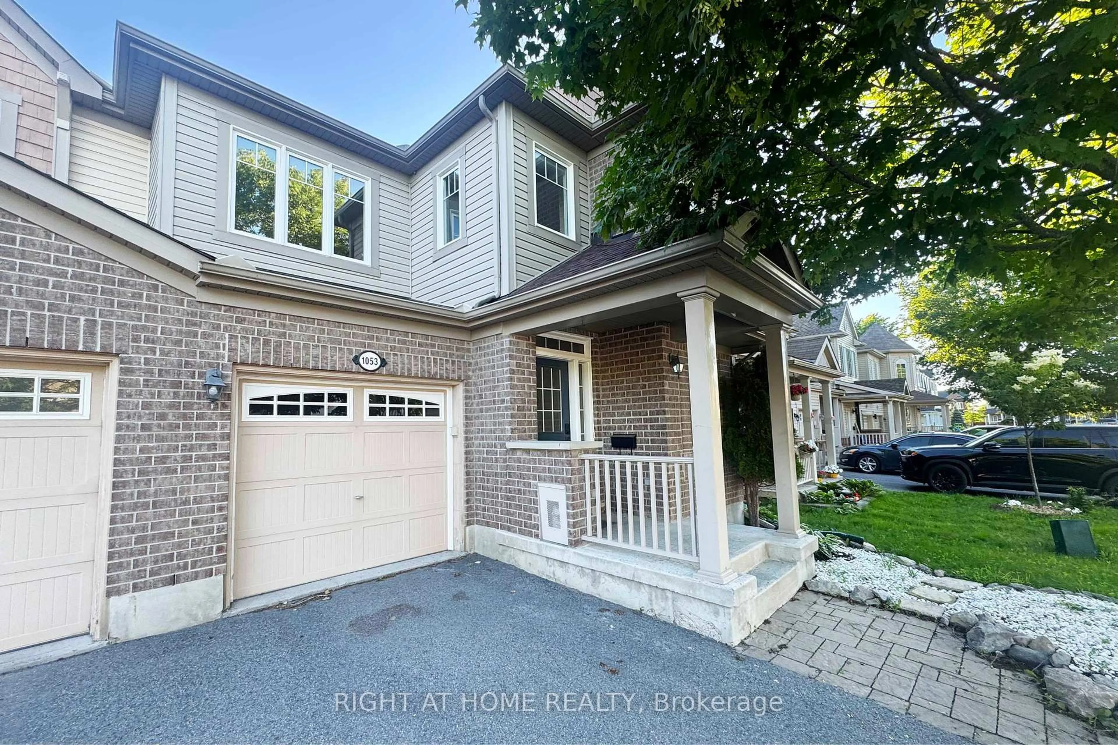 Home with brick exterior material, street for 1053 PAMPERO Cres, Ottawa Ontario K2S 0N5