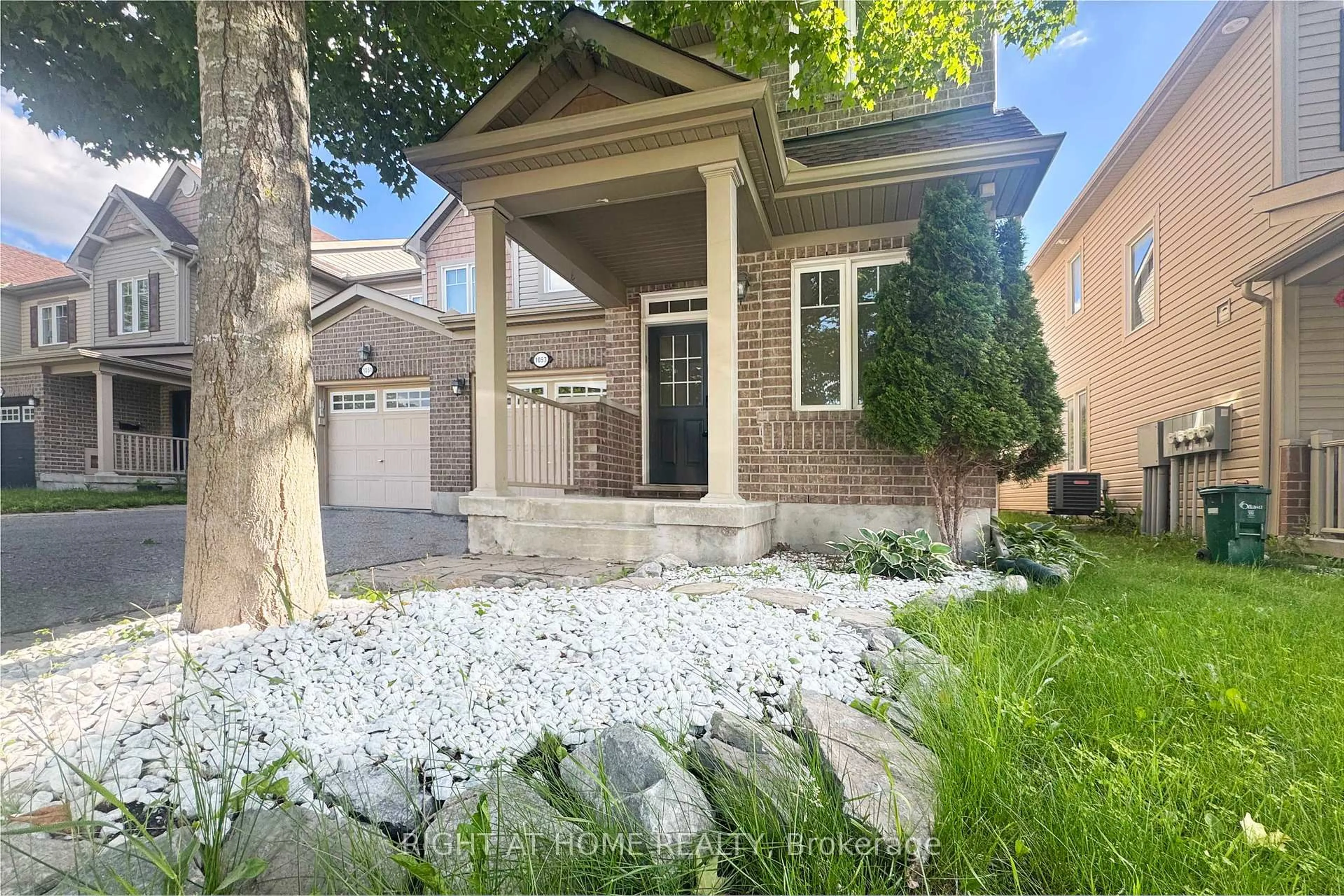 Home with brick exterior material, street for 1053 PAMPERO Cres, Ottawa Ontario K2S 0N5