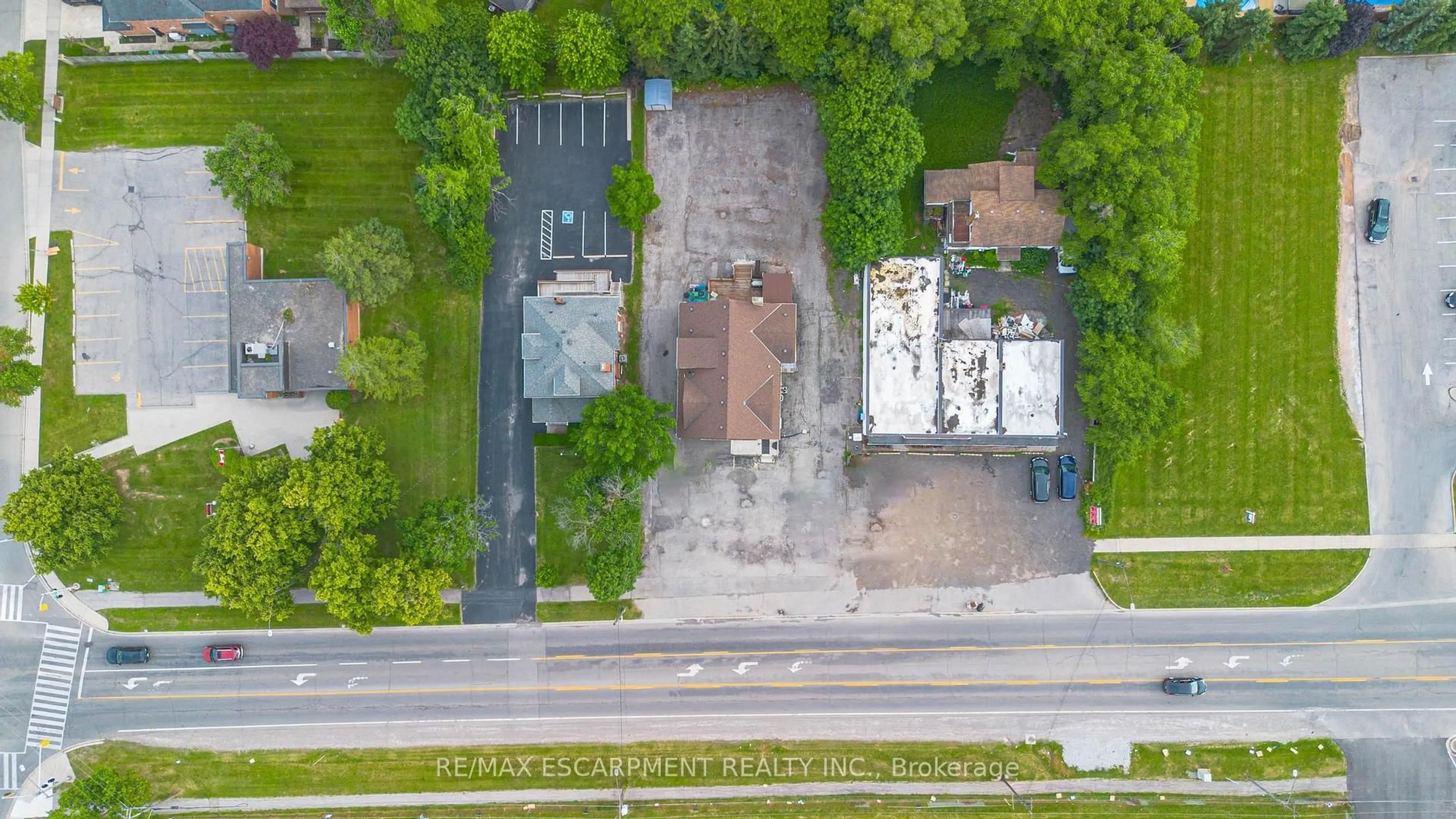 A pic from outside/outdoor area/front of a property/back of a property/a pic from drone, street for 1260 Highway 8, Hamilton Ontario L8E 5Y3
