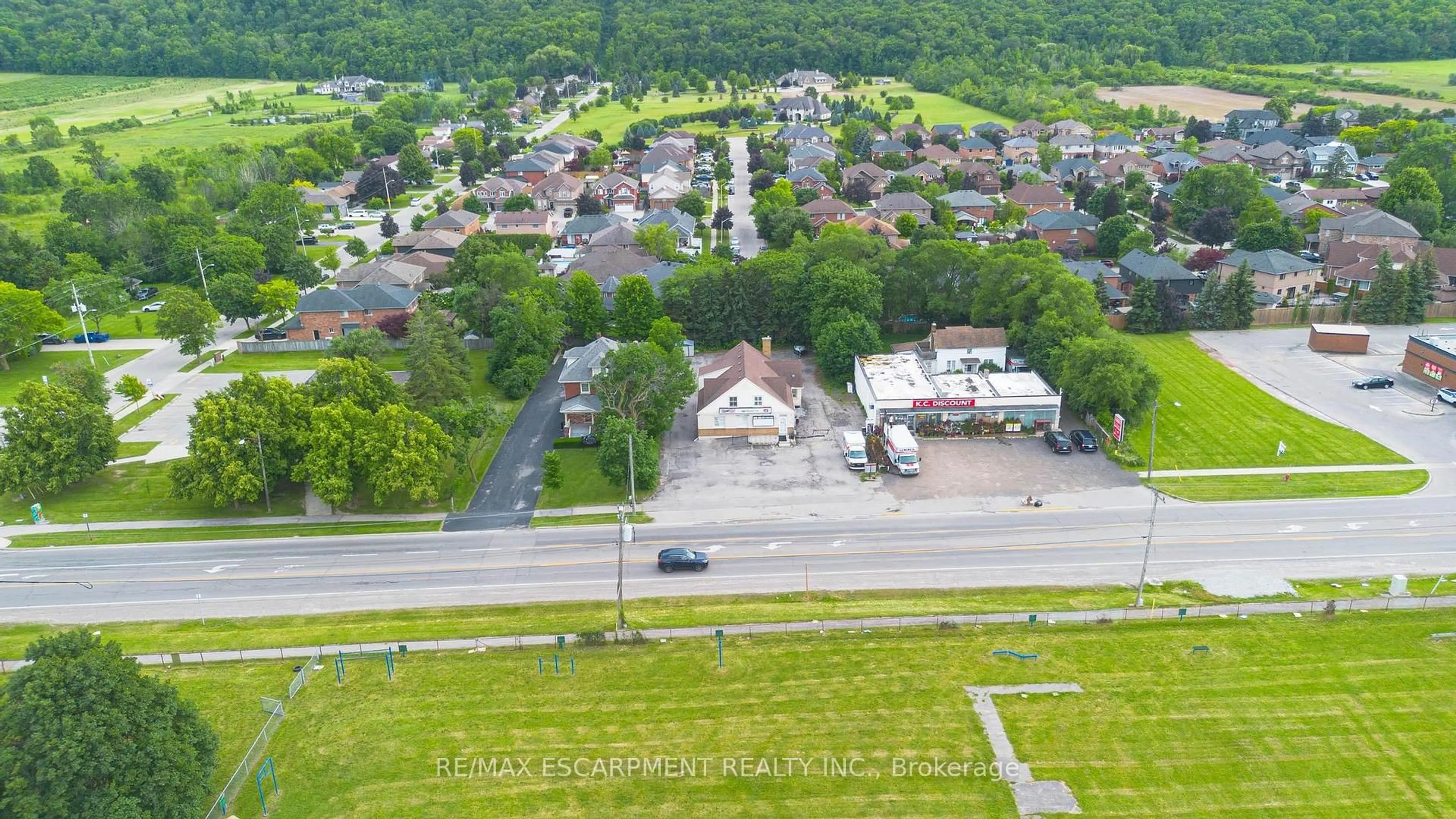 A pic from outside/outdoor area/front of a property/back of a property/a pic from drone, street for 1260 Highway 8, Hamilton Ontario L8E 5Y3