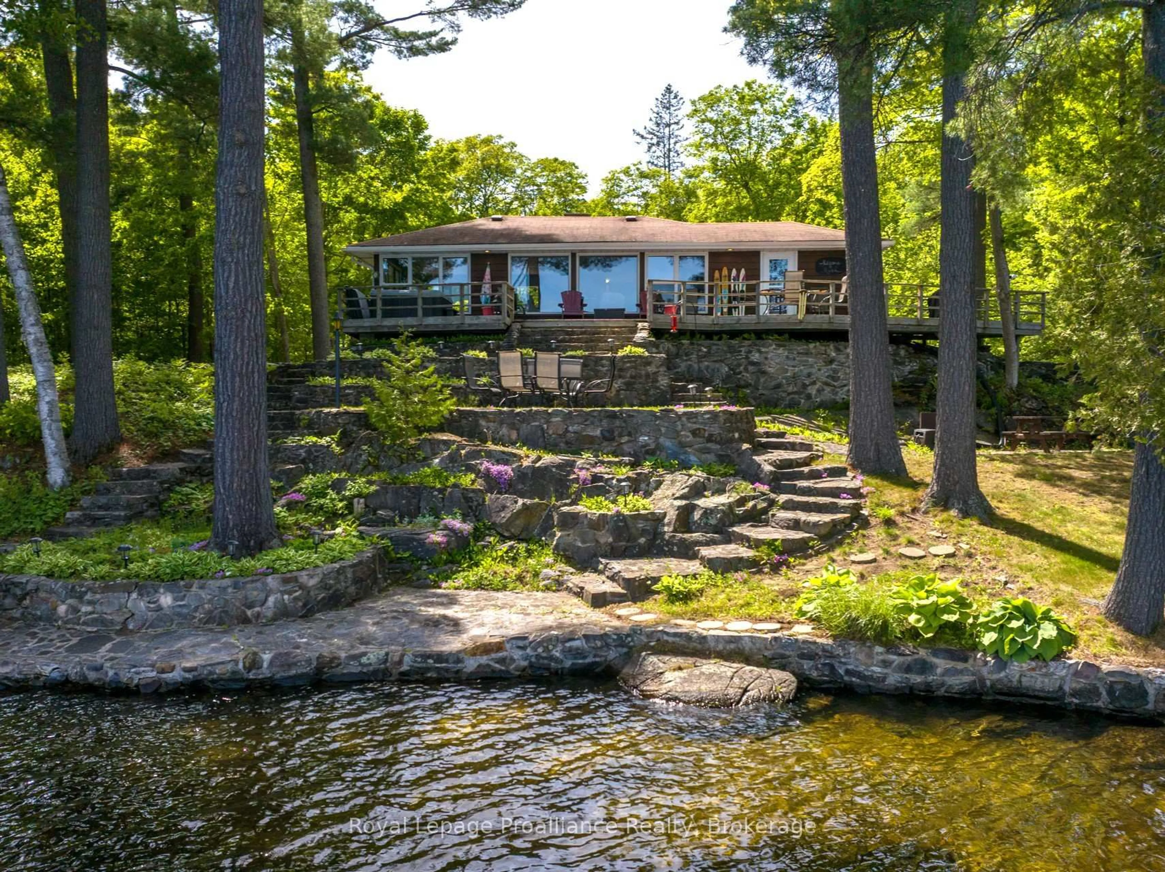 A pic from outside/outdoor area/front of a property/back of a property/a pic from drone, water/lake/river/ocean view for 1022 Fosters Lane, Cloyne Ontario K0H 1K0