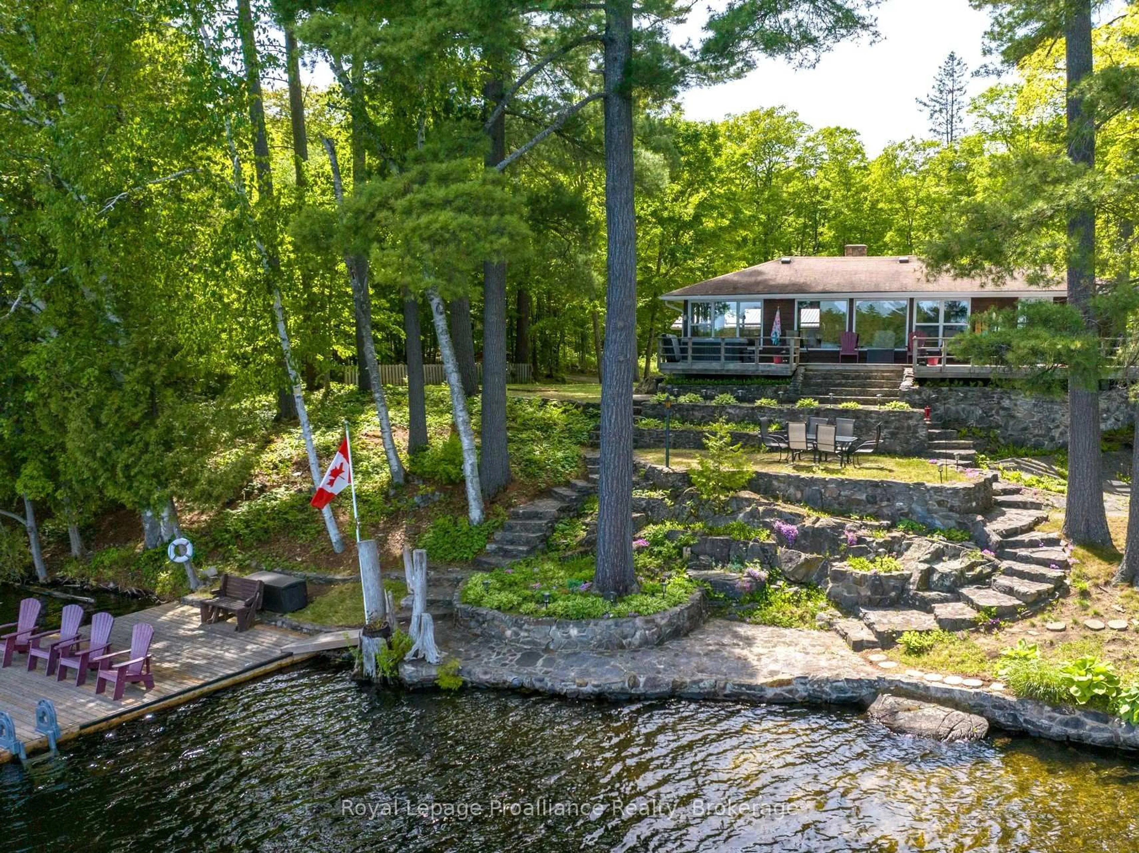 A pic from outside/outdoor area/front of a property/back of a property/a pic from drone, water/lake/river/ocean view for 1022 Fosters Lane, Cloyne Ontario K0H 1K0