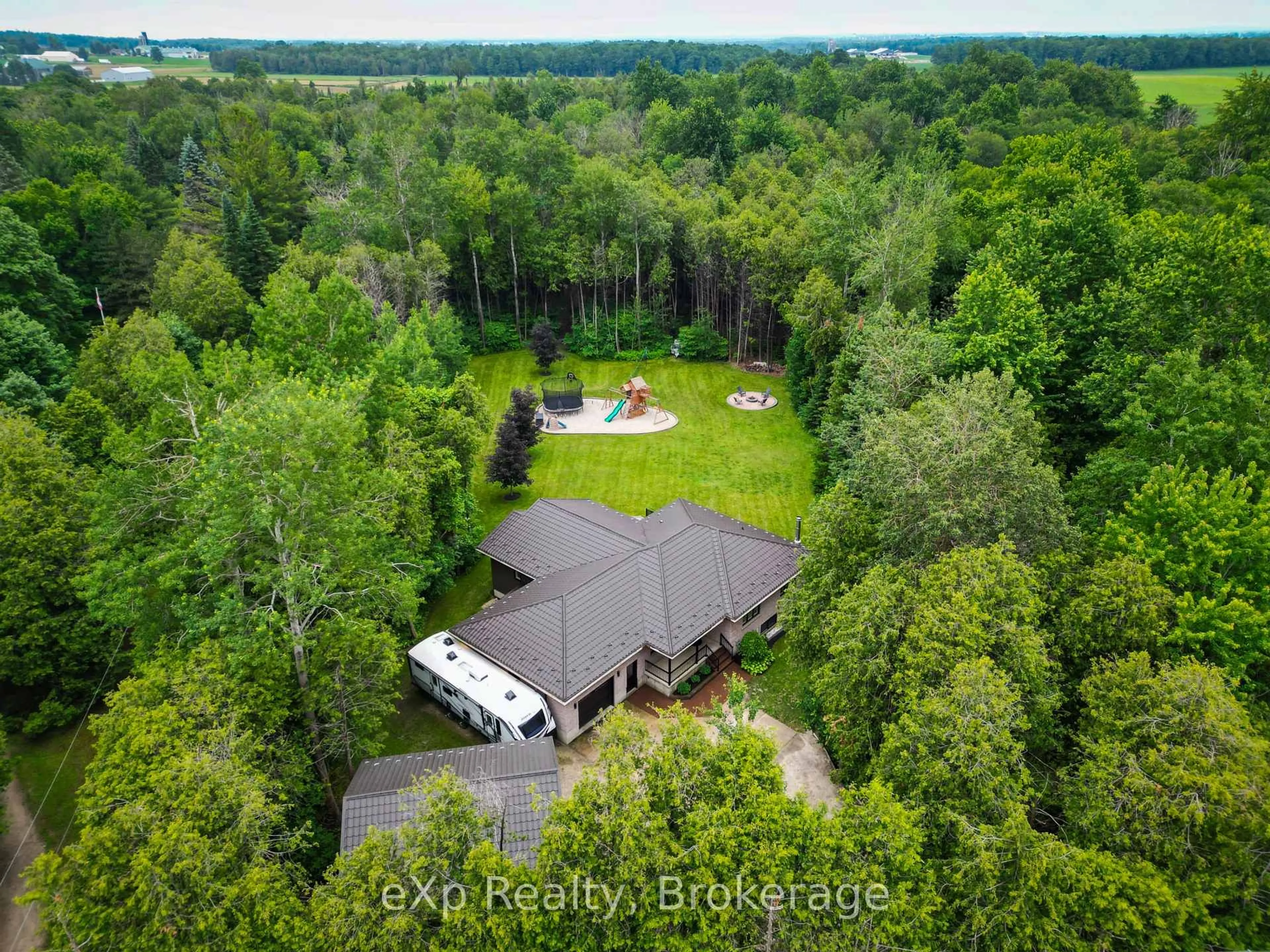 A pic from outside/outdoor area/front of a property/back of a property/a pic from drone, forest/trees view for 1509 Cedar Spring Rd, Woolwich Ontario N3B 2Z1