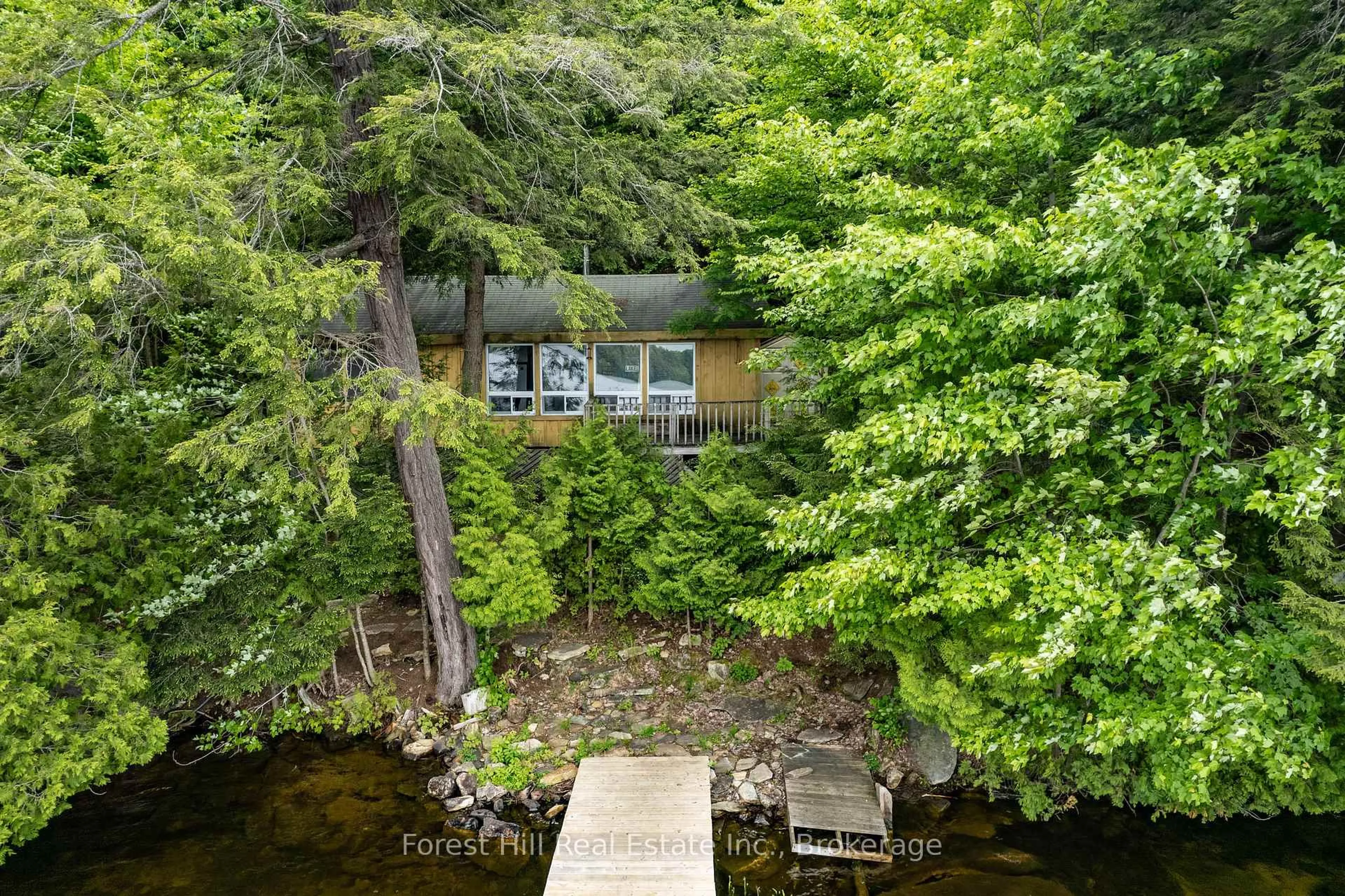 A pic from outside/outdoor area/front of a property/back of a property/a pic from drone, water/lake/river/ocean view for 1168 Inspiration Dr, Algonquin Highlands Ontario P0A 1E0