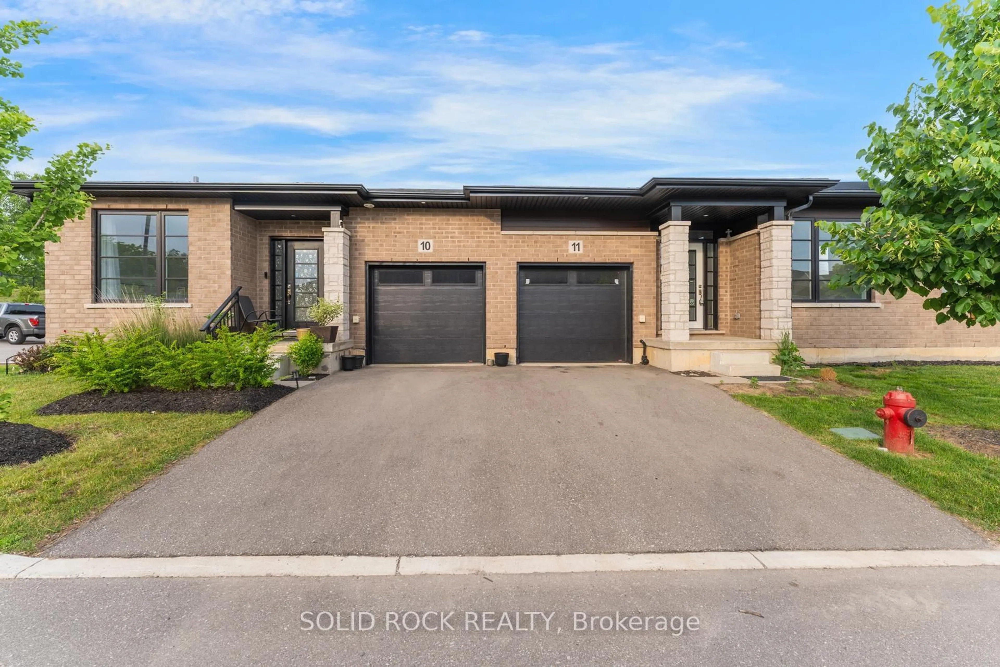 Home with brick exterior material, street for 550 Grey St #11, Brantford Ontario N3S 0C4