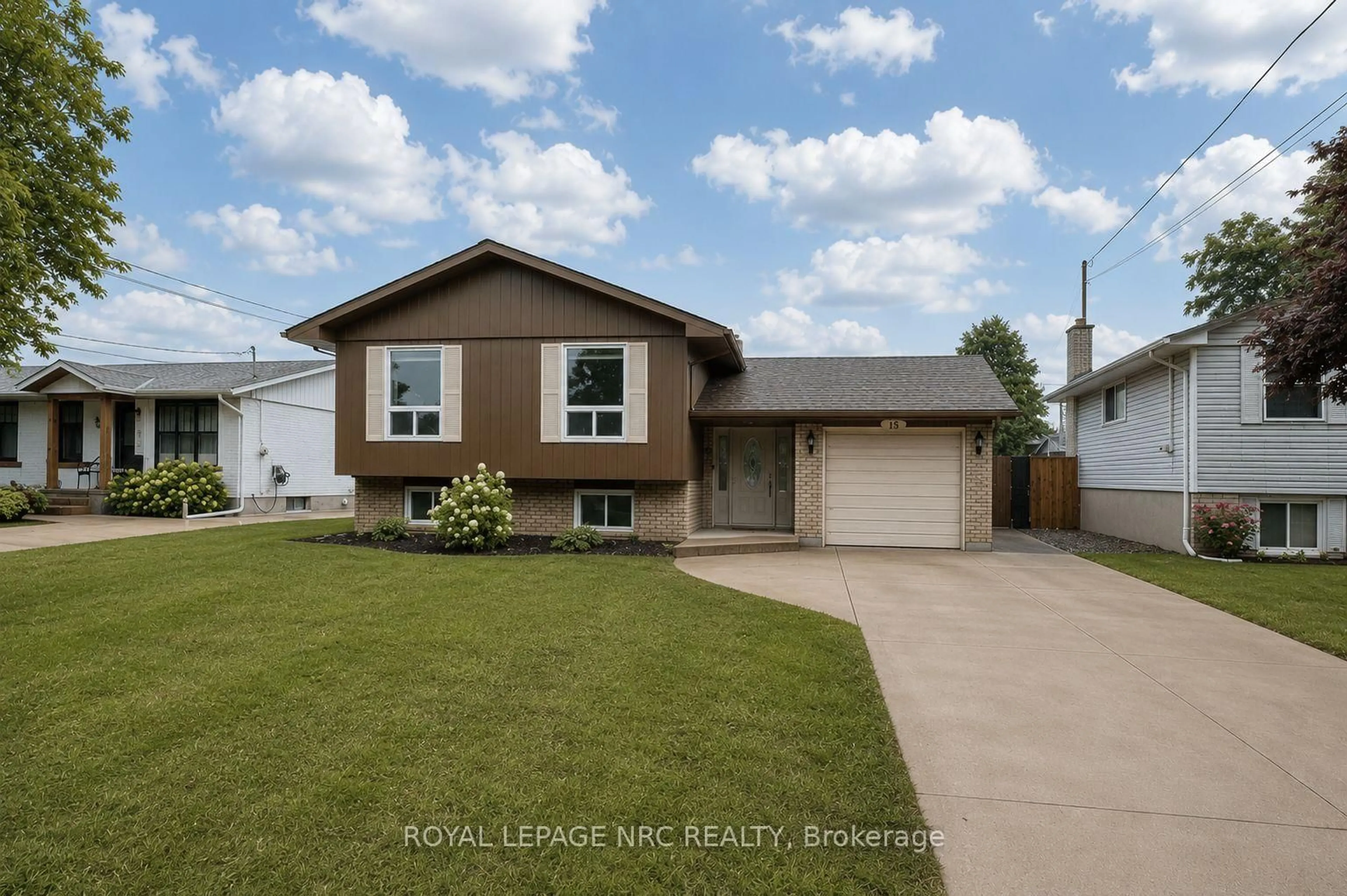 Home with vinyl exterior material, street for 15 Nickel St, St. Catharines Ontario L2M 1L4