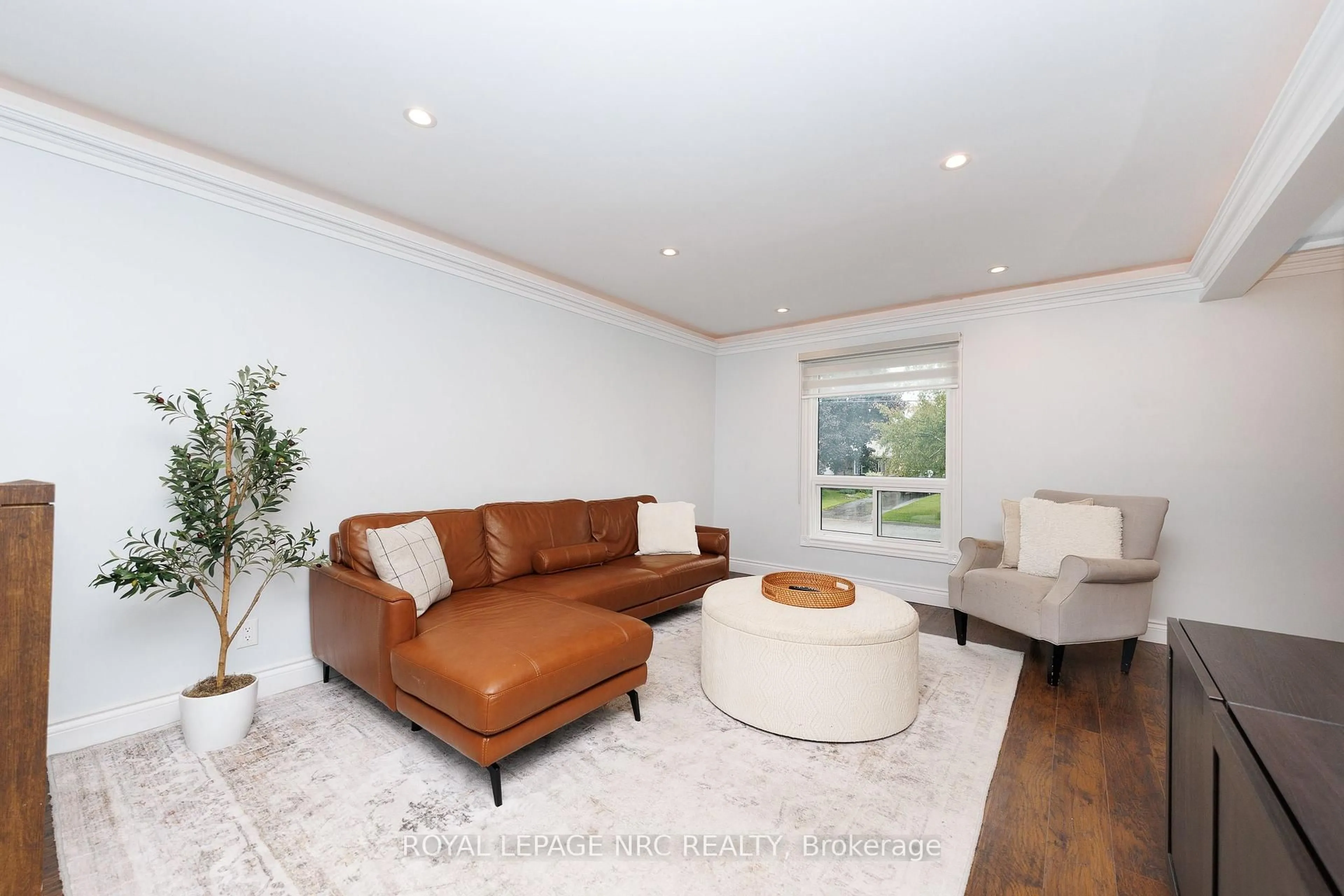 Living room with furniture, unknown for 15 Nickel St, St. Catharines Ontario L2M 1L4