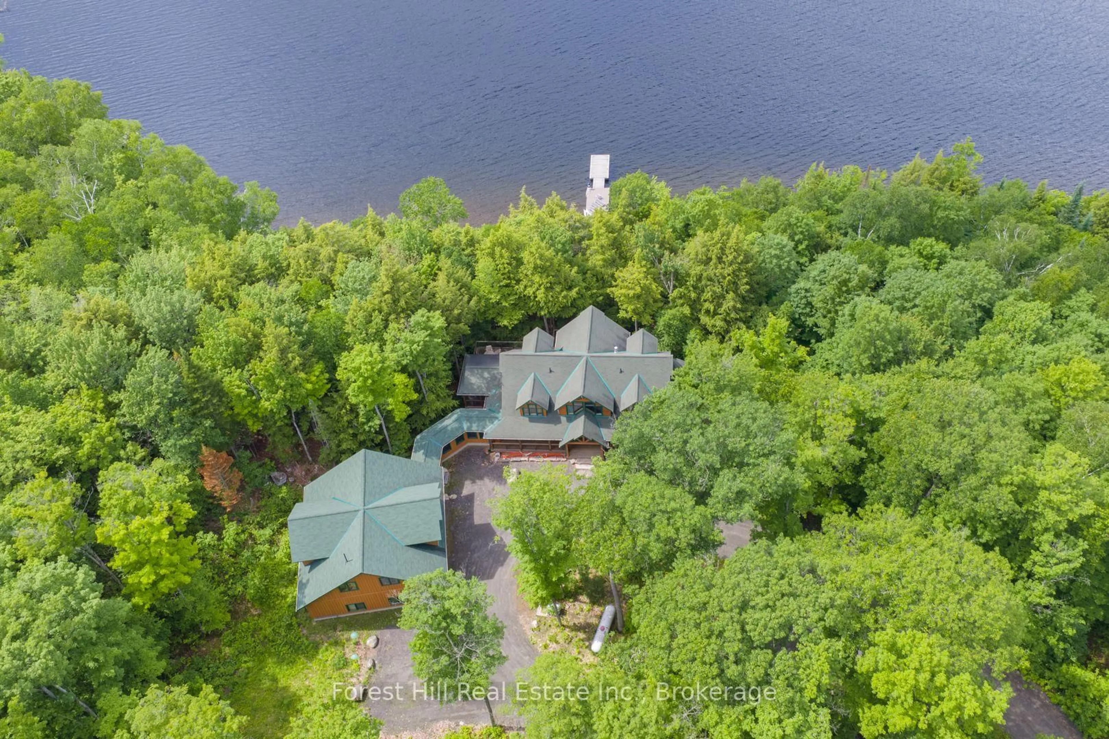 A pic from outside/outdoor area/front of a property/back of a property/a pic from drone, water/lake/river/ocean view for 5017 Kawagama Lake Rd, Algonquin Highlands Ontario P0A 1E0