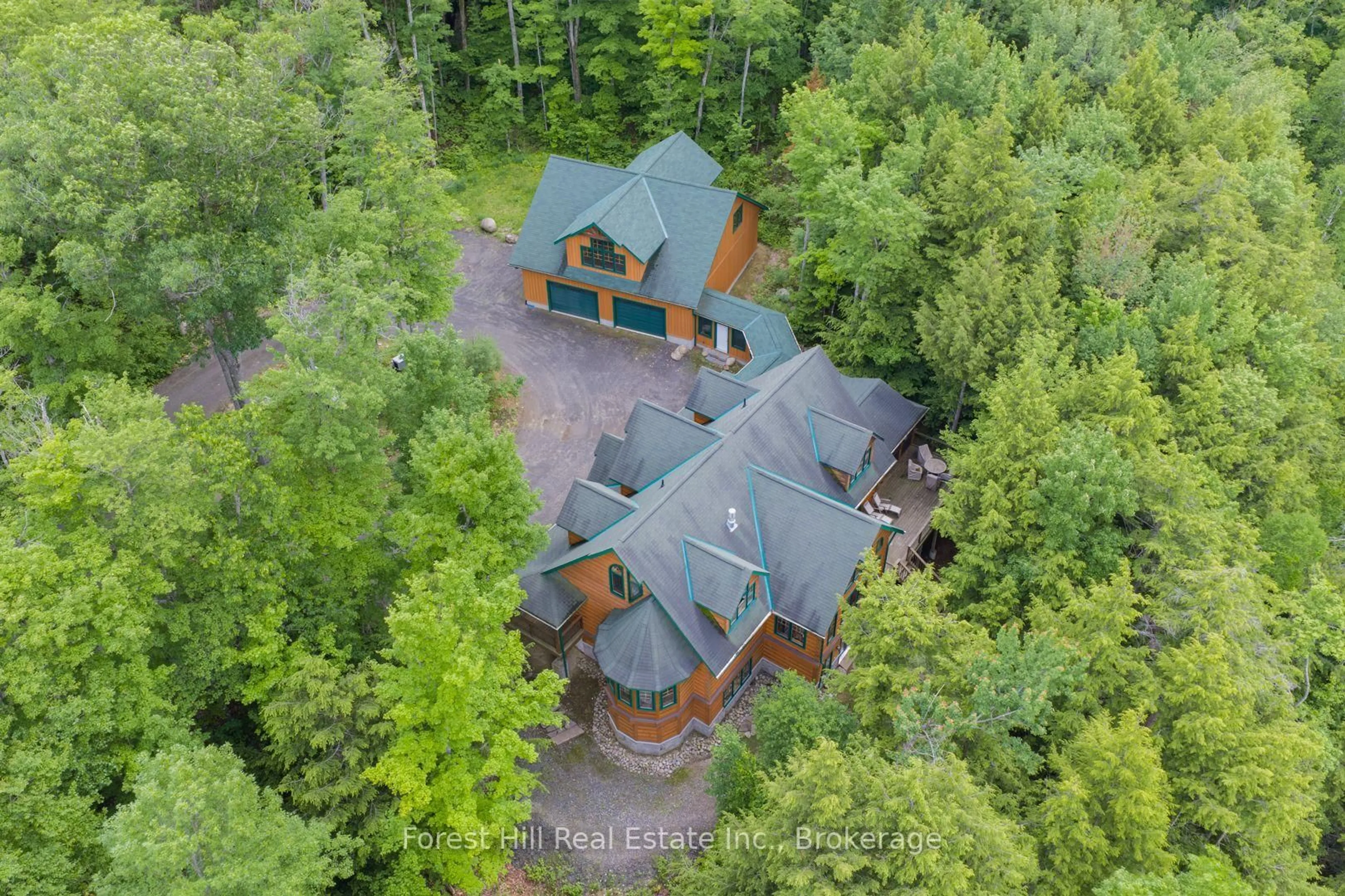 A pic from outside/outdoor area/front of a property/back of a property/a pic from drone, forest/trees view for 5017 Kawagama Lake Rd, Algonquin Highlands Ontario P0A 1E0