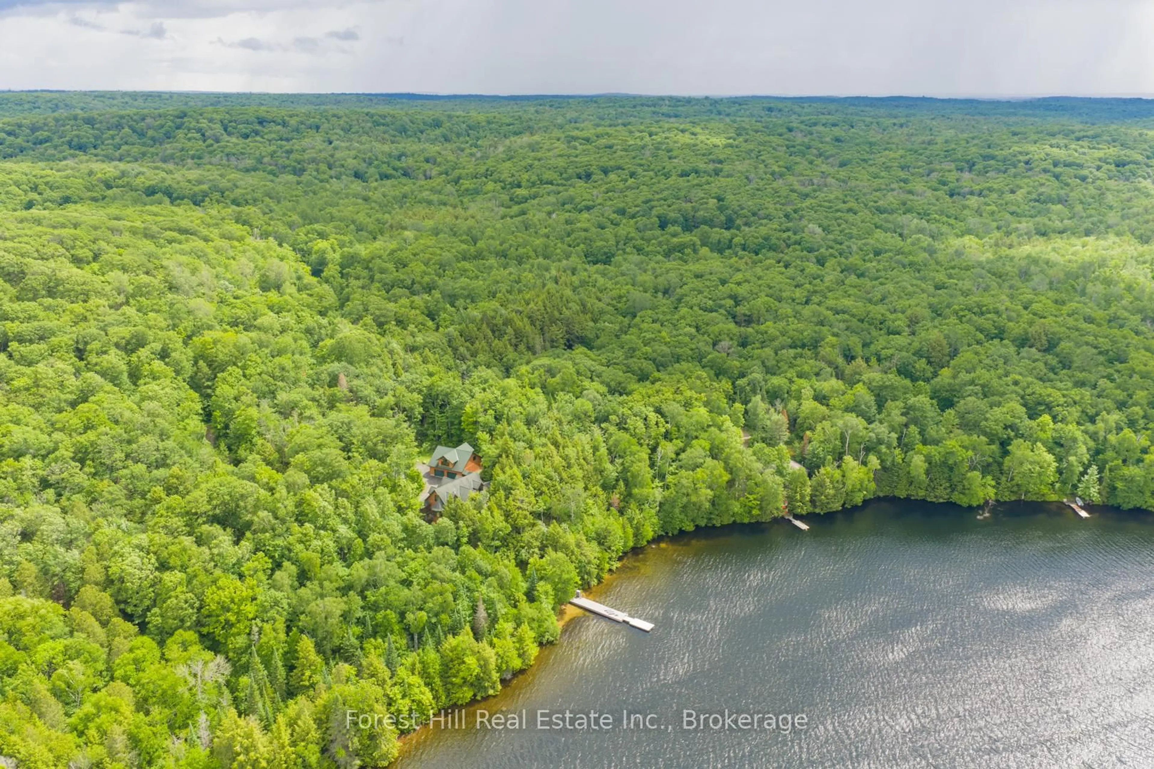A pic from outside/outdoor area/front of a property/back of a property/a pic from drone, water/lake/river/ocean view for 5017 Kawagama Lake Rd, Algonquin Highlands Ontario P0A 1E0