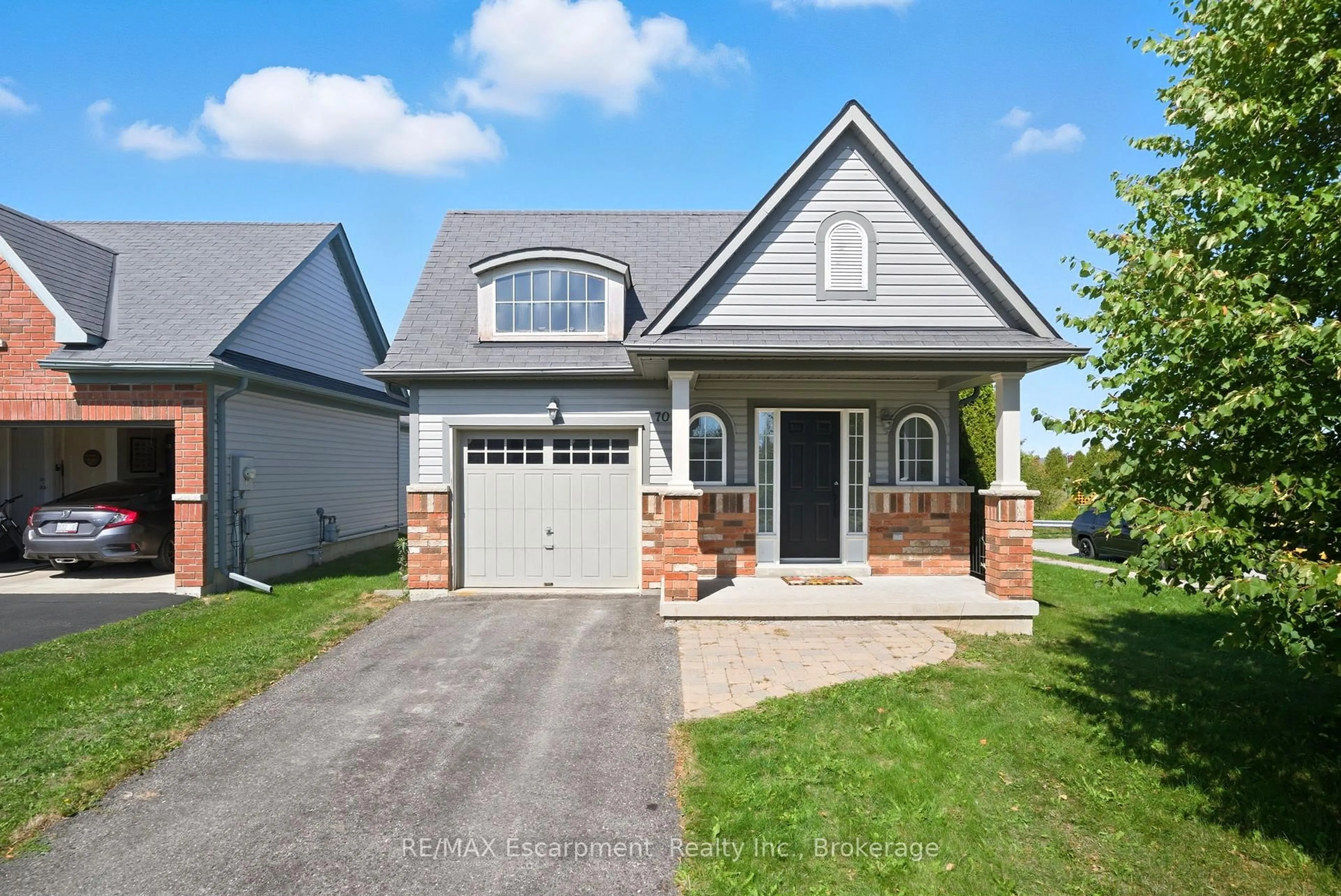 Home with brick exterior material, street for 70 Cook St, Kawartha Lakes Ontario K9V 0C7