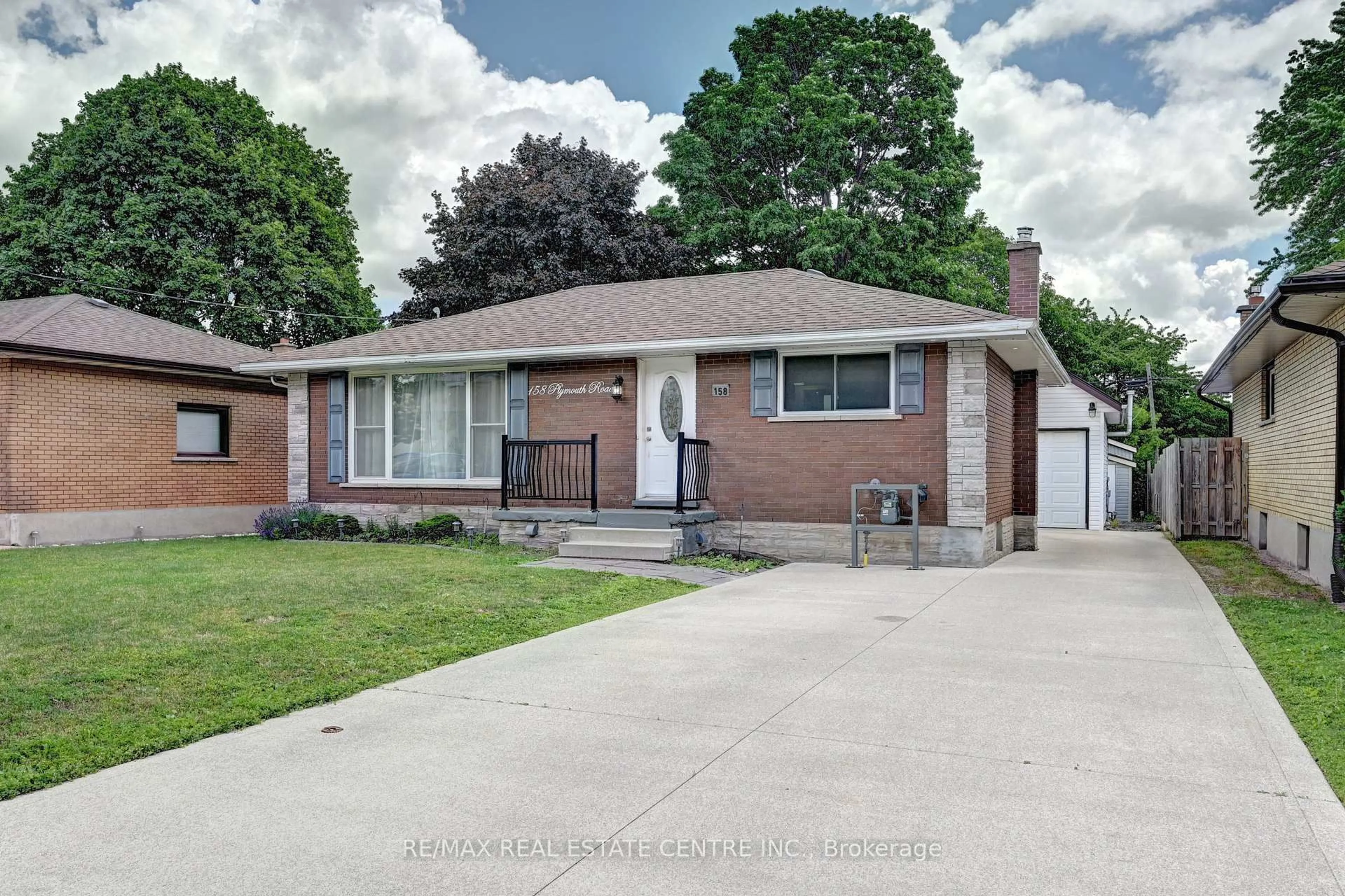 Home with brick exterior material, street for 158 Plymouth Rd, Kitchener Ontario N2G 3G5