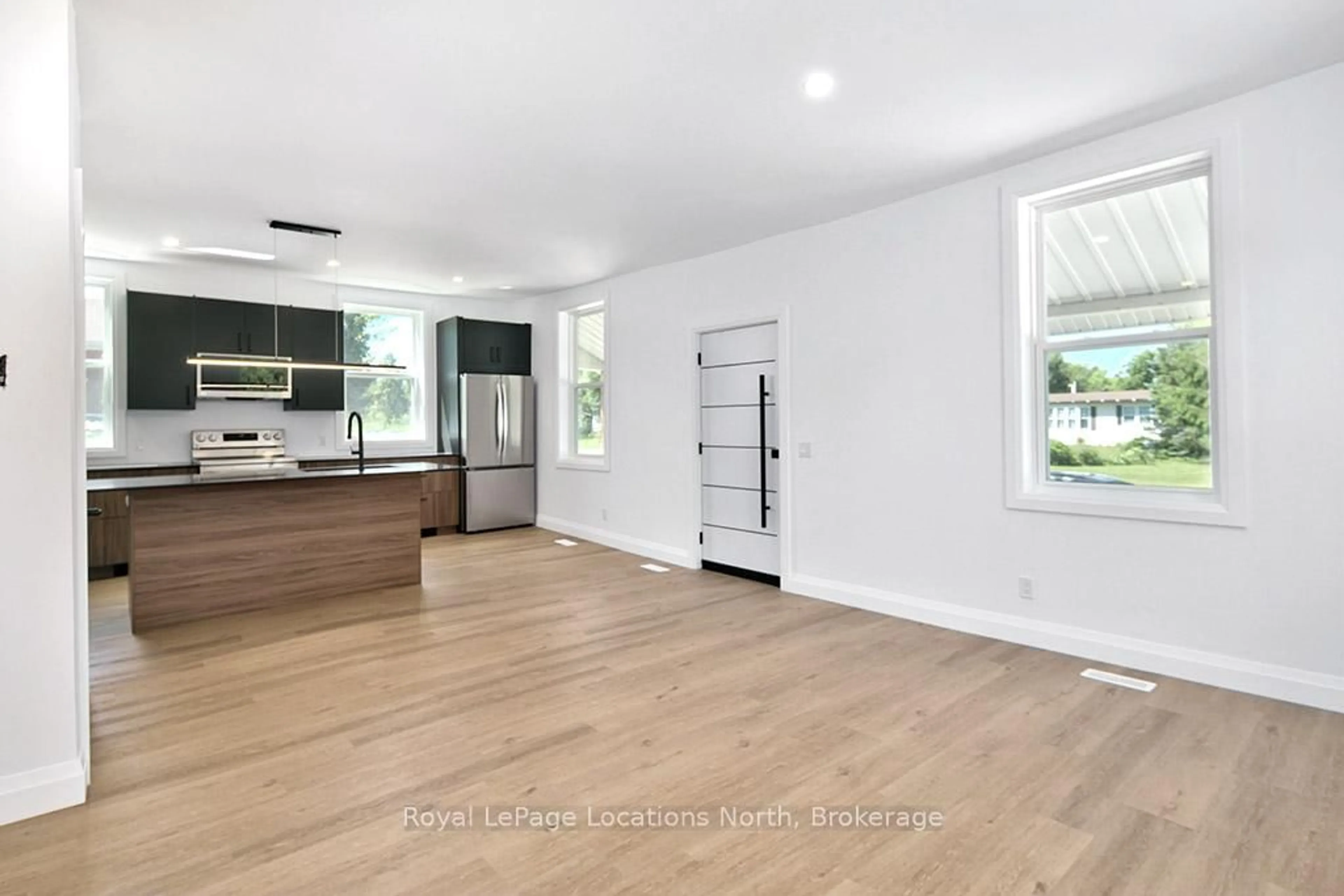 Open concept kitchen, wood/laminate floor for 597335 Grey Rd 29 Rd, Meaford Ontario N0H 1E0