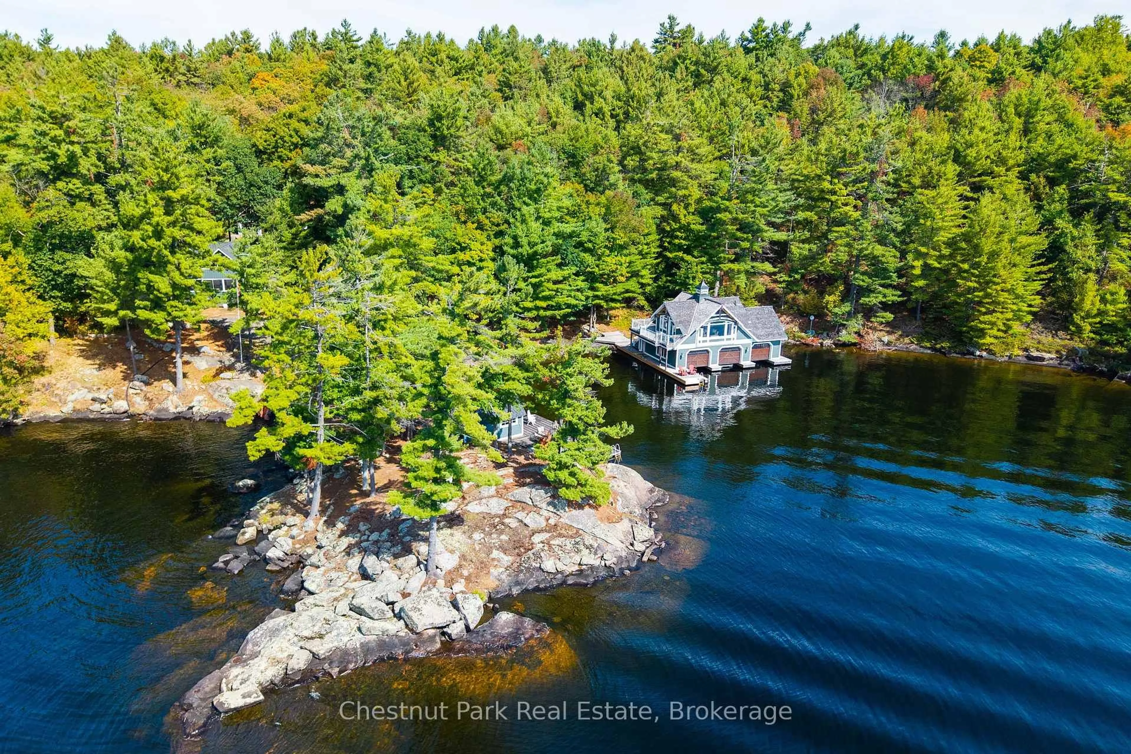 A pic from outside/outdoor area/front of a property/back of a property/a pic from drone, water/lake/river/ocean view for 1121 Scarcliffe Rd #20, Muskoka Lakes Ontario P0B 1J0
