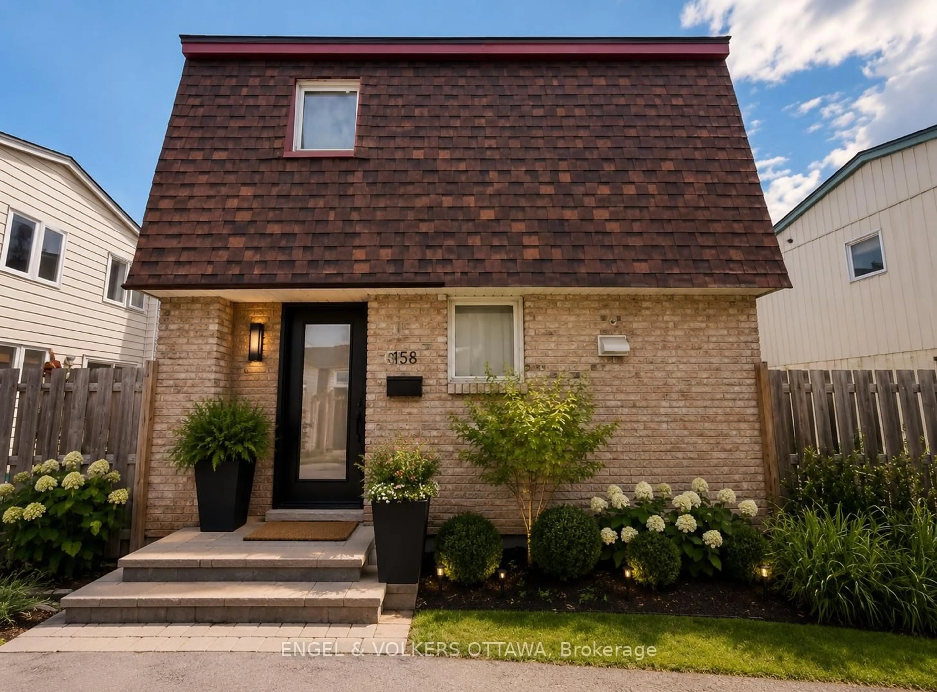 Home with brick exterior material, street for 2063 Jasmine Cres #65, Ottawa Ontario K1J 7W2