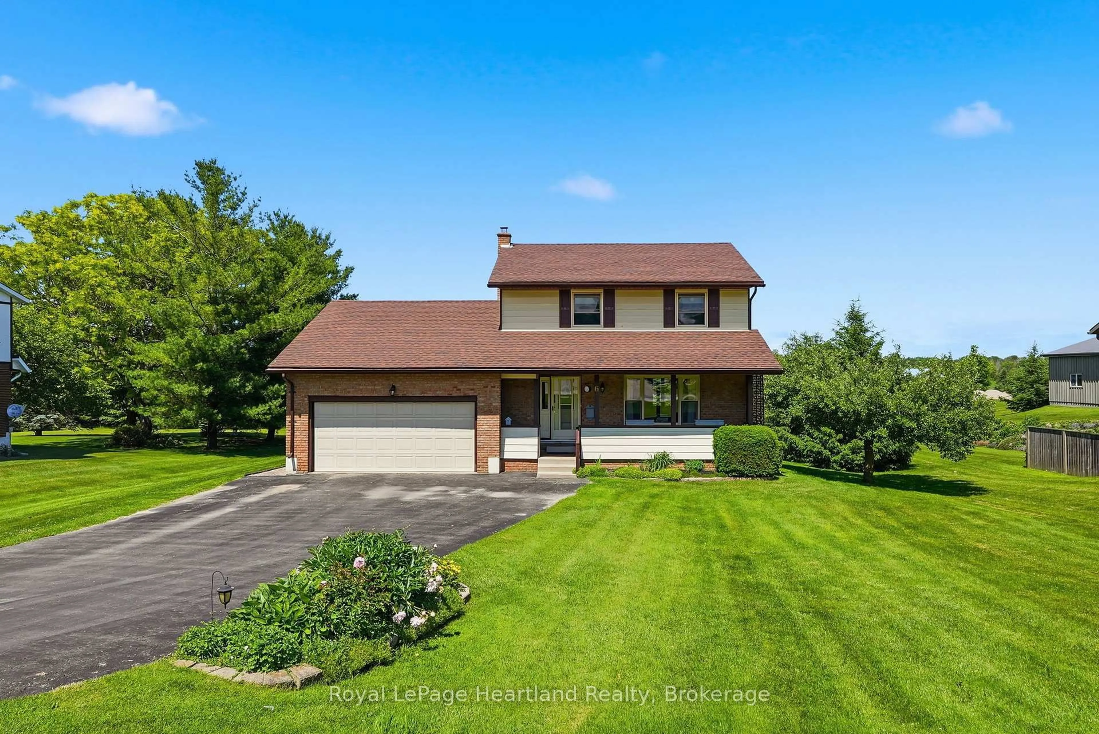 A pic from outside/outdoor area/front of a property/back of a property/a pic from drone, water/lake/river/ocean view for 6 Brown St, Minto Ontario N0G 1M0