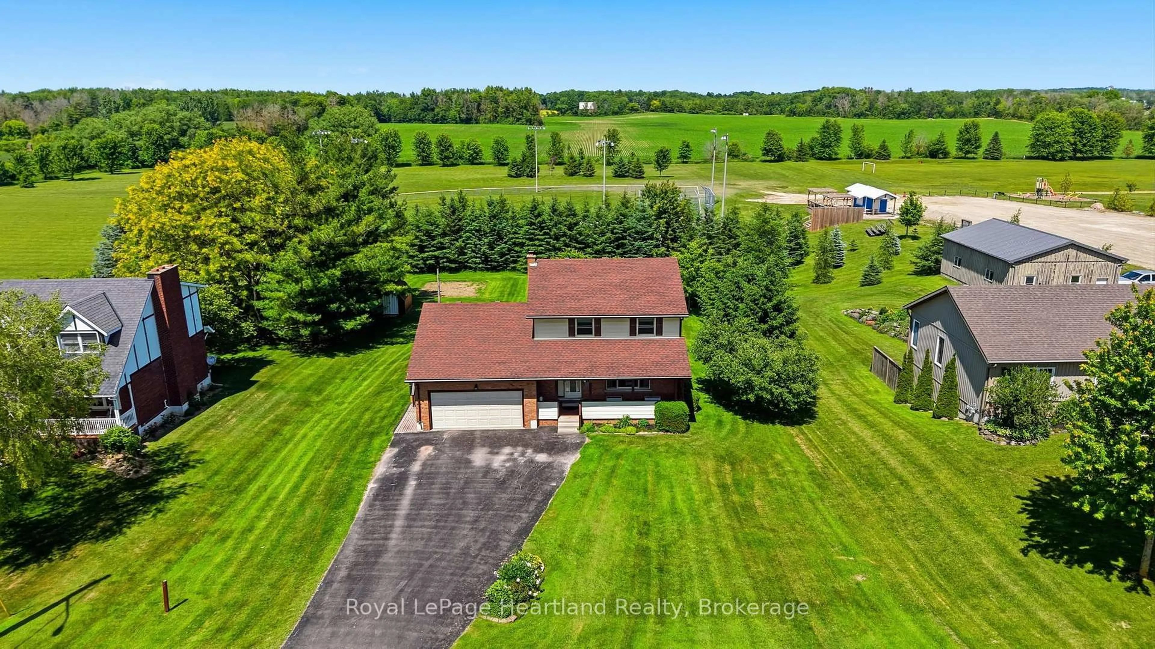 A pic from outside/outdoor area/front of a property/back of a property/a pic from drone, water/lake/river/ocean view for 6 Brown St, Minto Ontario N0G 1M0