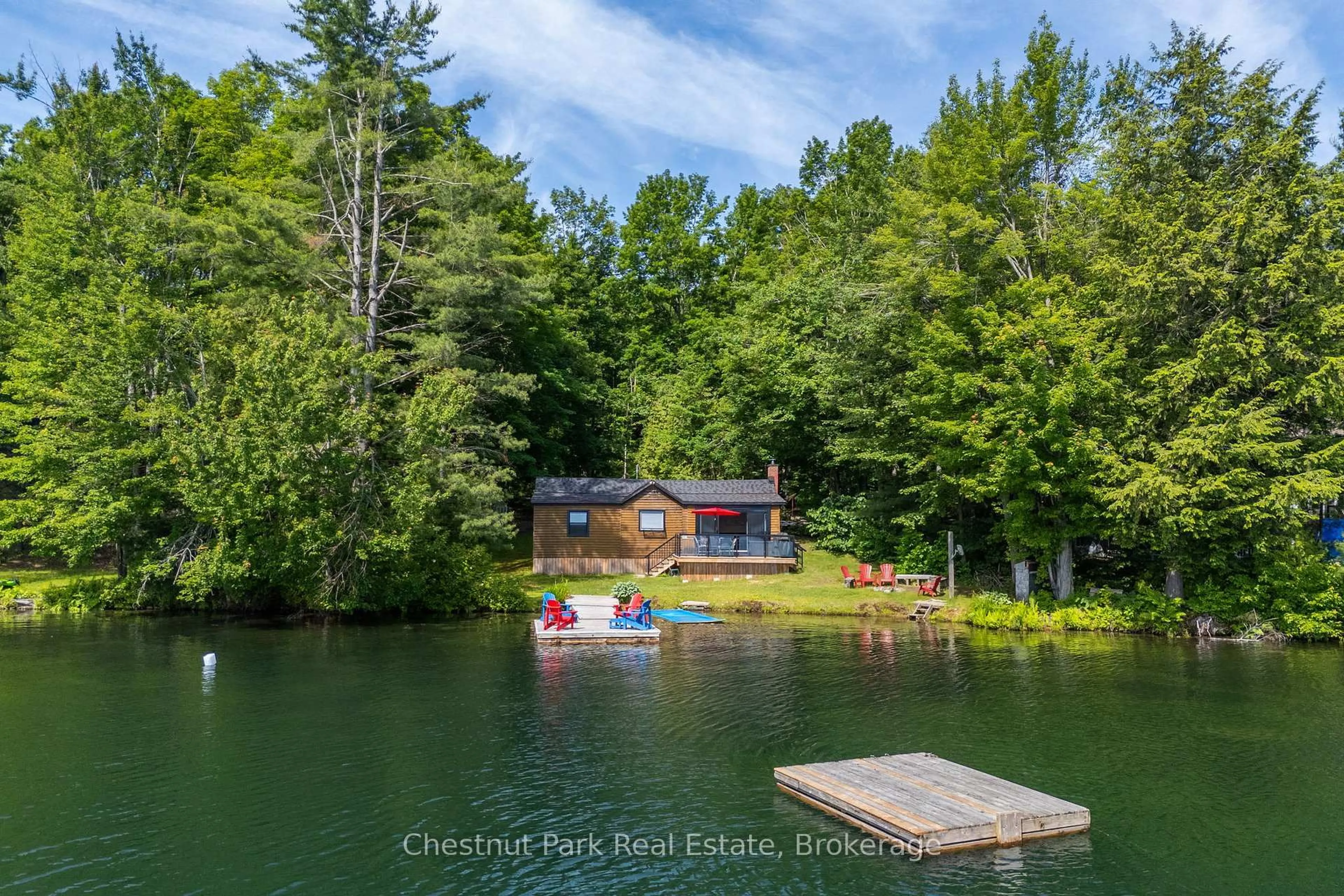 A pic from outside/outdoor area/front of a property/back of a property/a pic from drone, water/lake/river/ocean view for 1143 Ridge Rd #3, Muskoka Lakes Ontario P0C 1M0