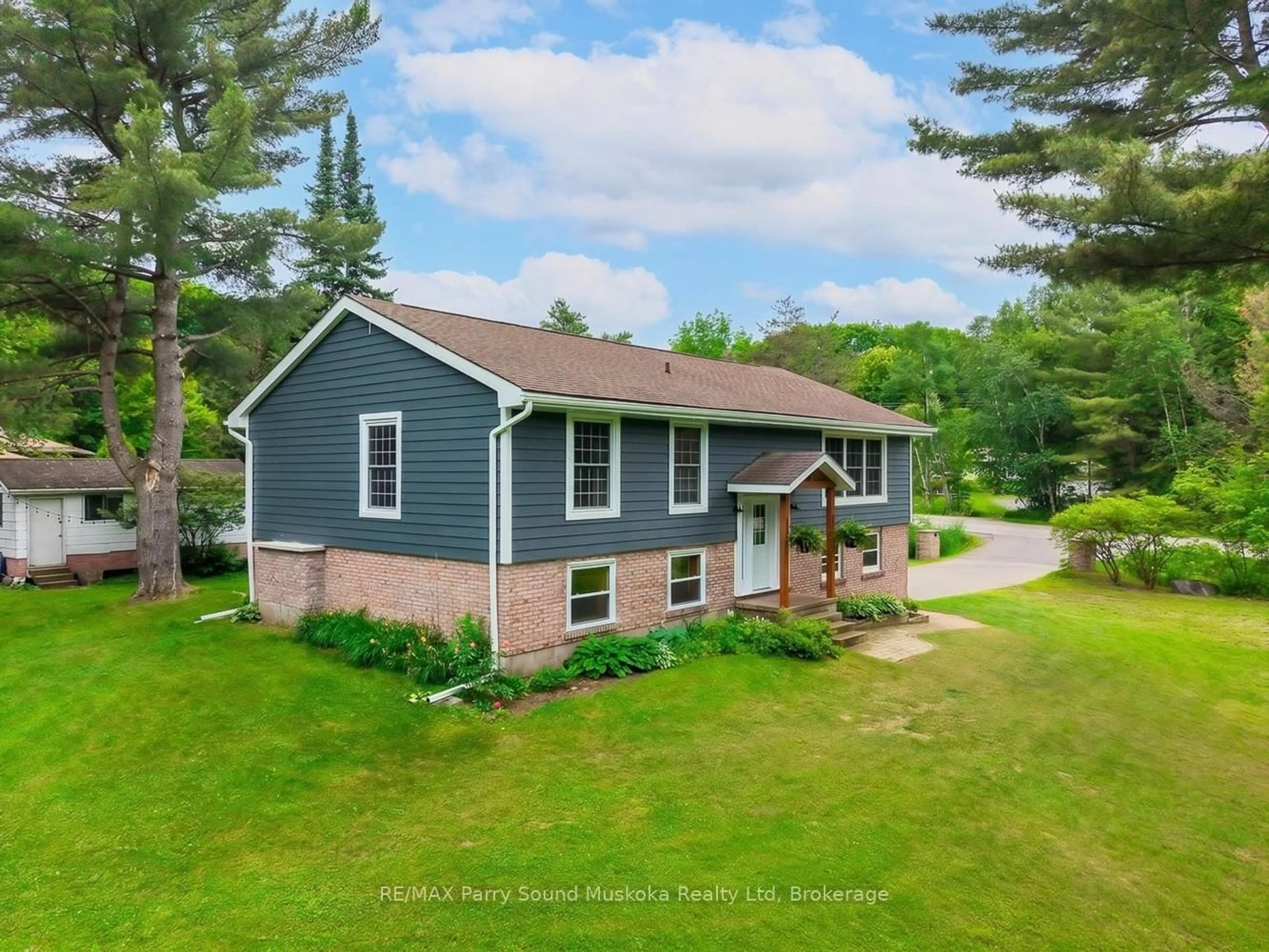 A pic from outside/outdoor area/front of a property/back of a property/a pic from drone, water/lake/river/ocean view for 109 North Rd, McDougall Ontario P2A 2W9