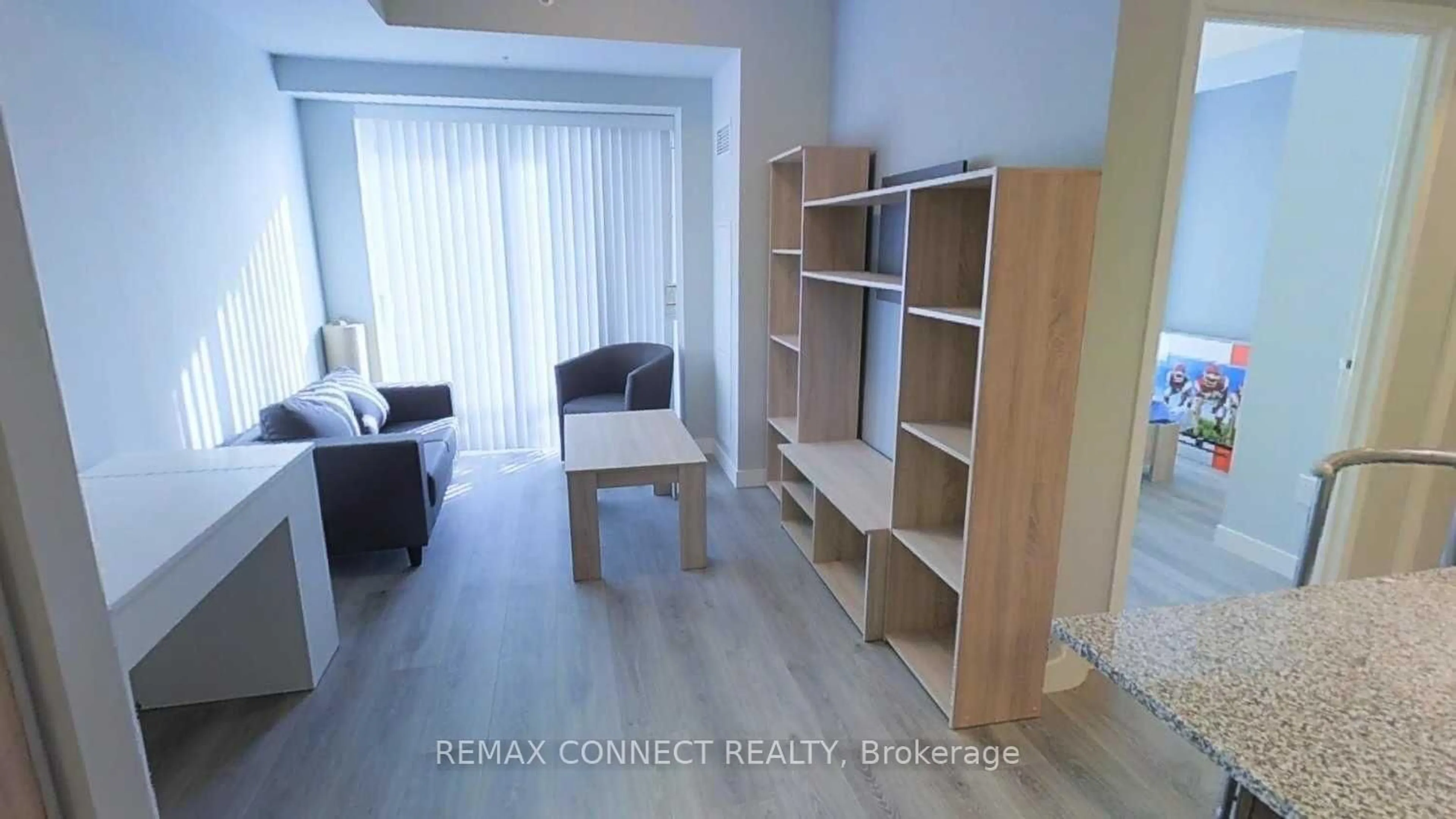 Living room with furniture, wood/laminate floor for 318 Spruce St St #810, Waterloo Ontario N2L 3M7