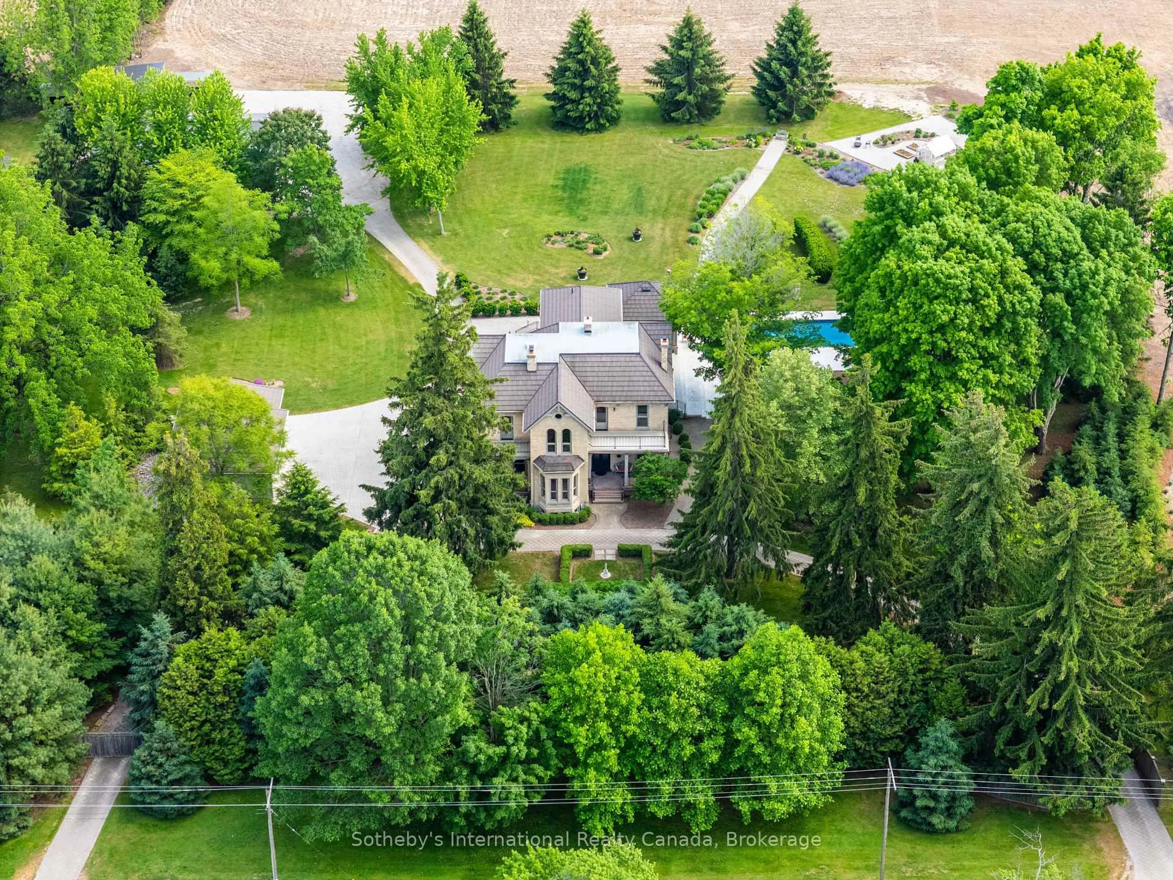 A pic from outside/outdoor area/front of a property/back of a property/a pic from drone, unknown for 50005 John Wise Line, Malahide Ontario N5H 2R5
