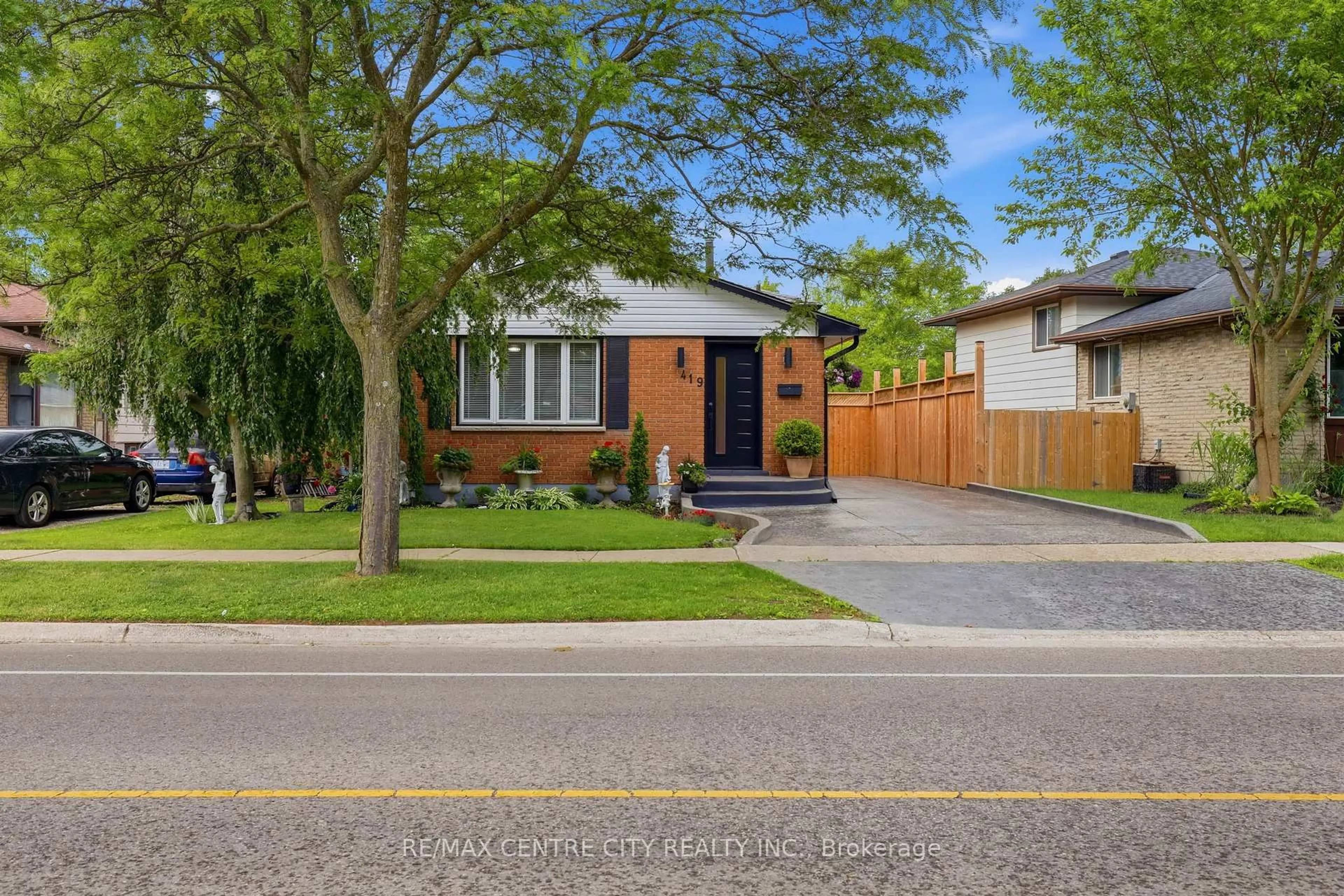 Home with brick exterior material, street for 419 Ferndale Ave, London South Ontario N6C 2Y9