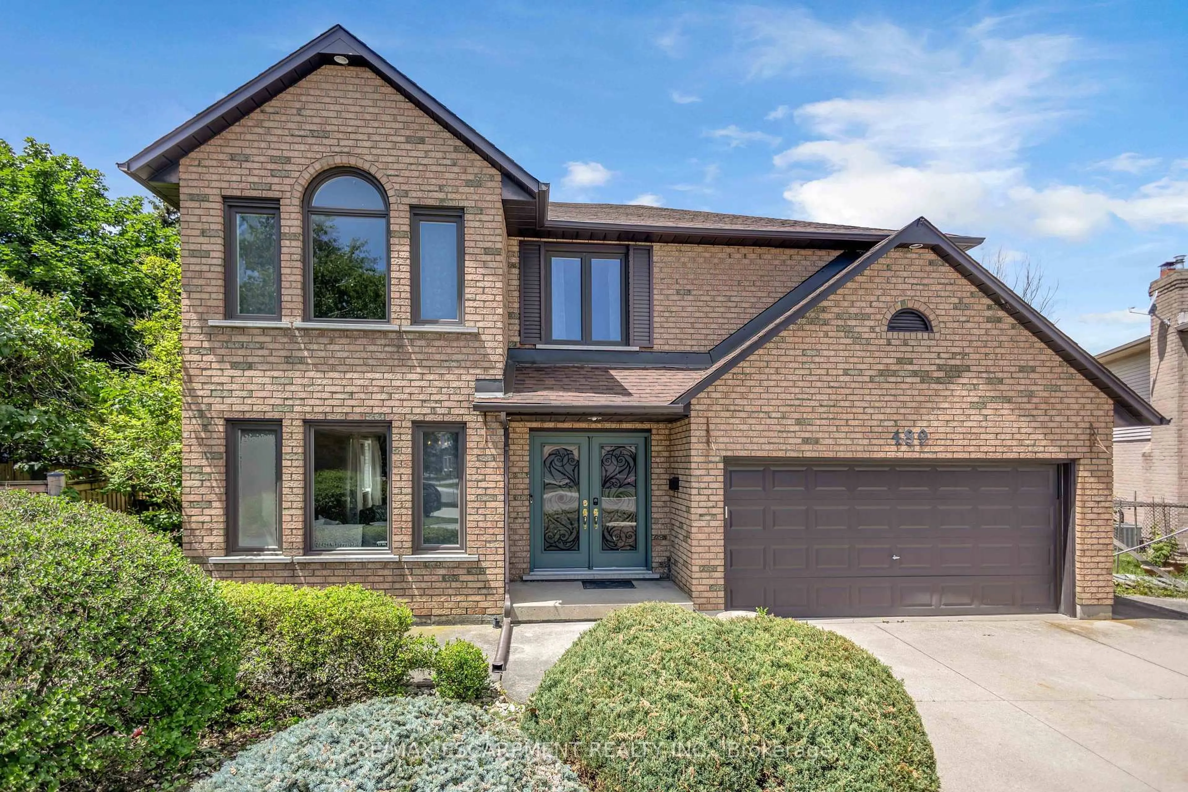 Home with brick exterior material, street for 489 Acadia Dr, Hamilton Ontario L8W 3A3