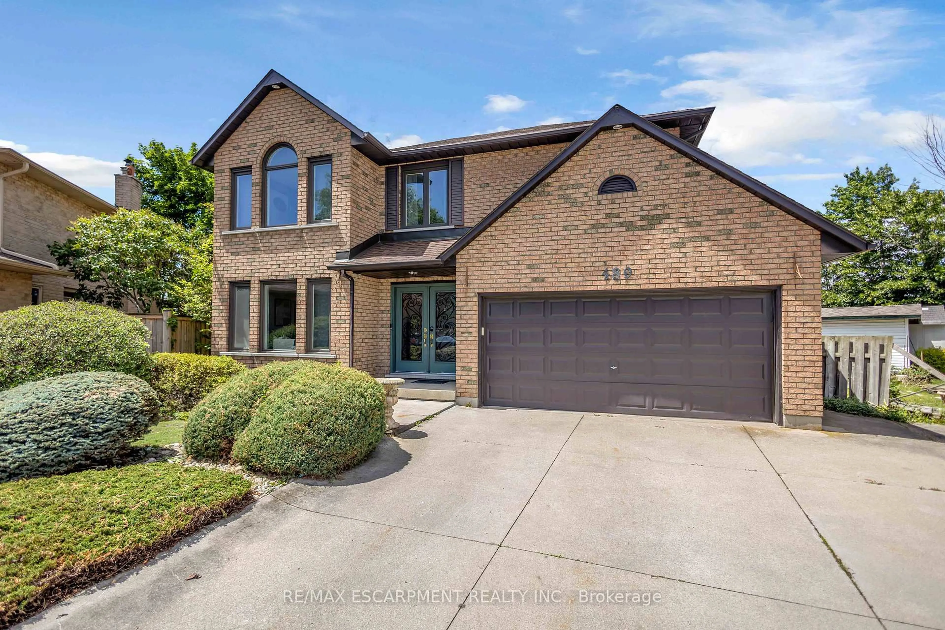 Home with brick exterior material, street for 489 Acadia Dr, Hamilton Ontario L8W 3A3