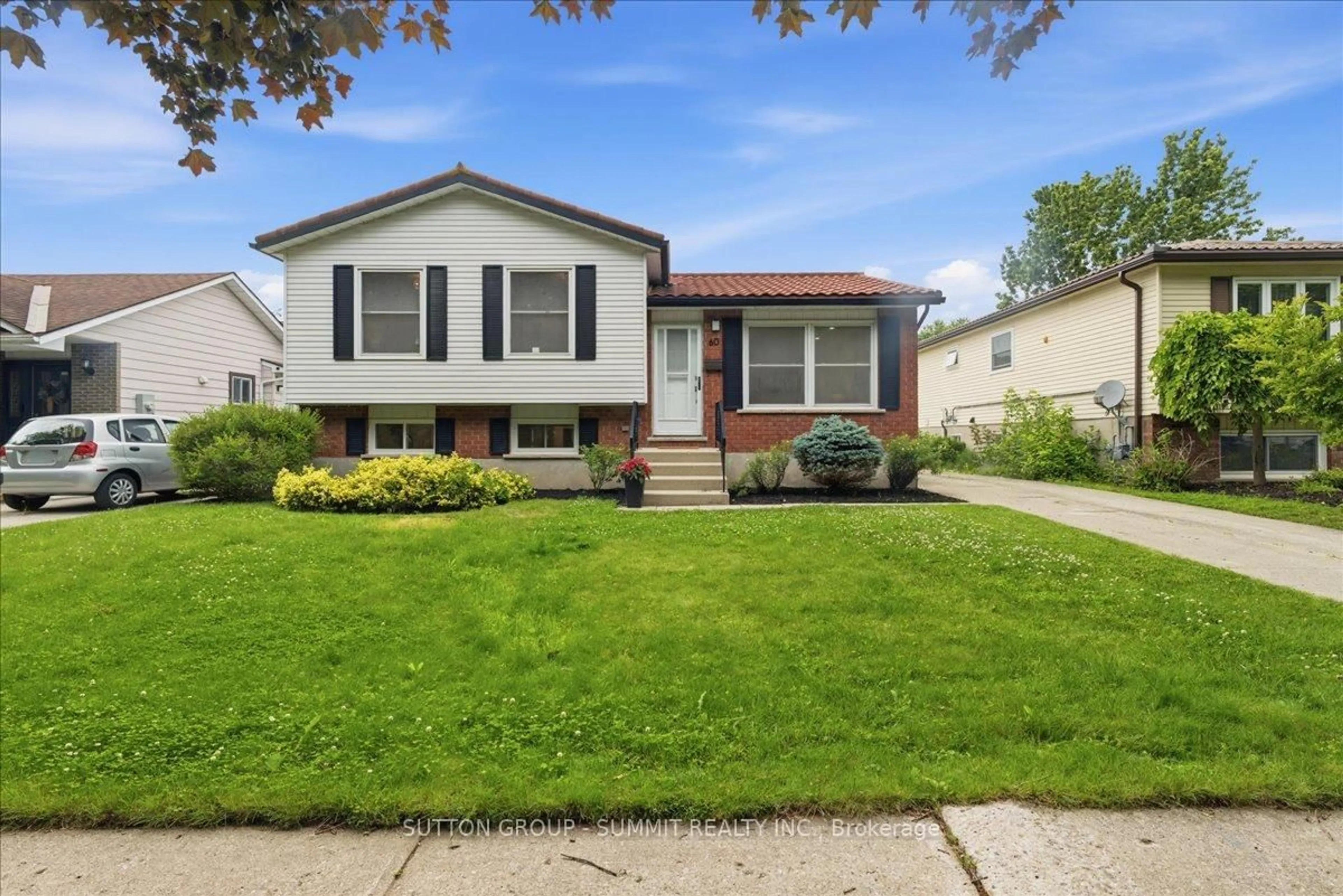 Home with vinyl exterior material, street for 60 Nethercott Dr, Stratford Ontario N5A 7G4