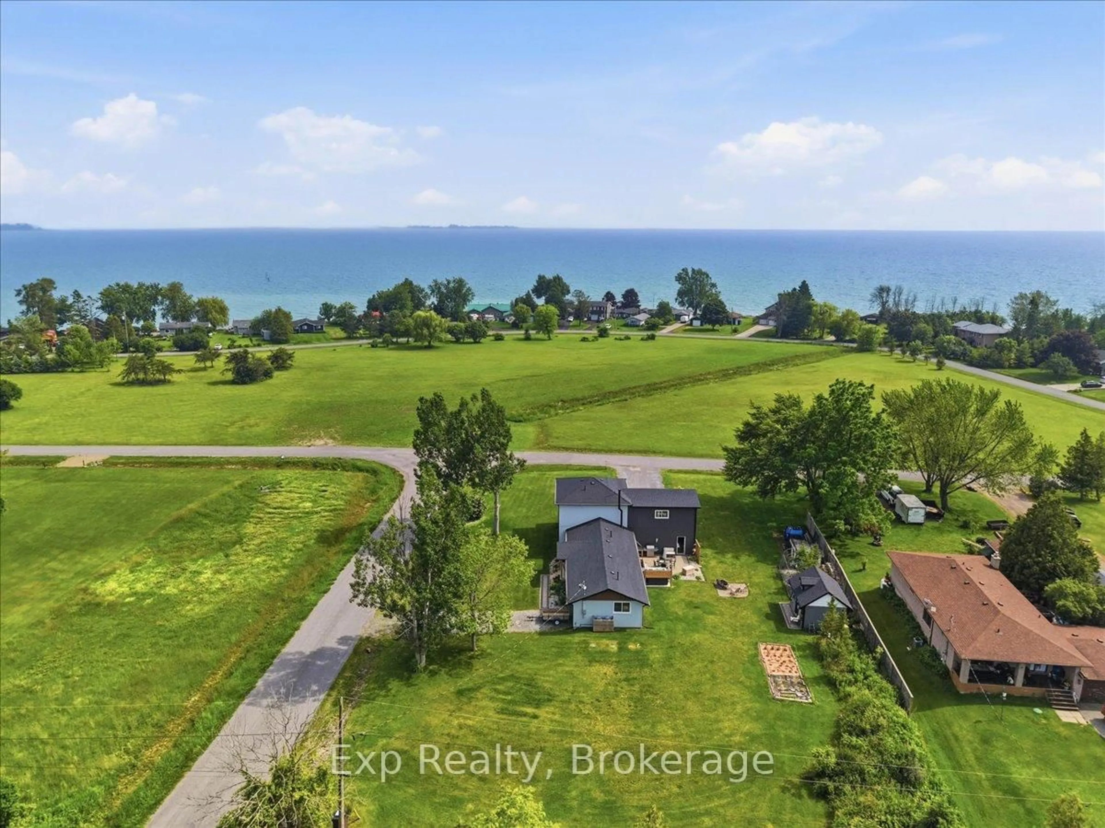 A pic from outside/outdoor area/front of a property/back of a property/a pic from drone, water/lake/river/ocean view for 27 Greenway Circ, Brighton Ontario K0K 1H0