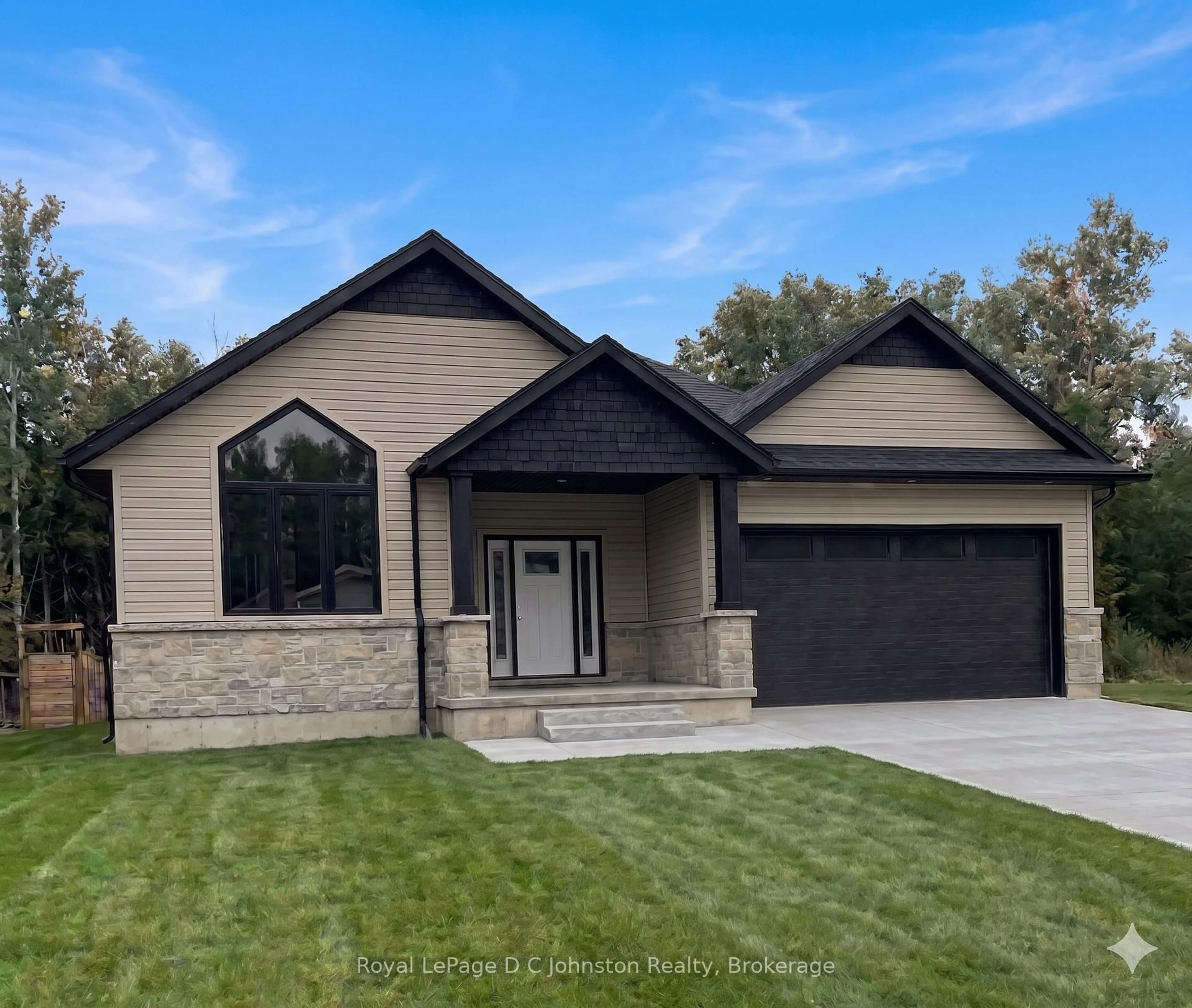 Home with vinyl exterior material, street for 14 Lakeforest Dr, Saugeen Shores Ontario N0H 2L0