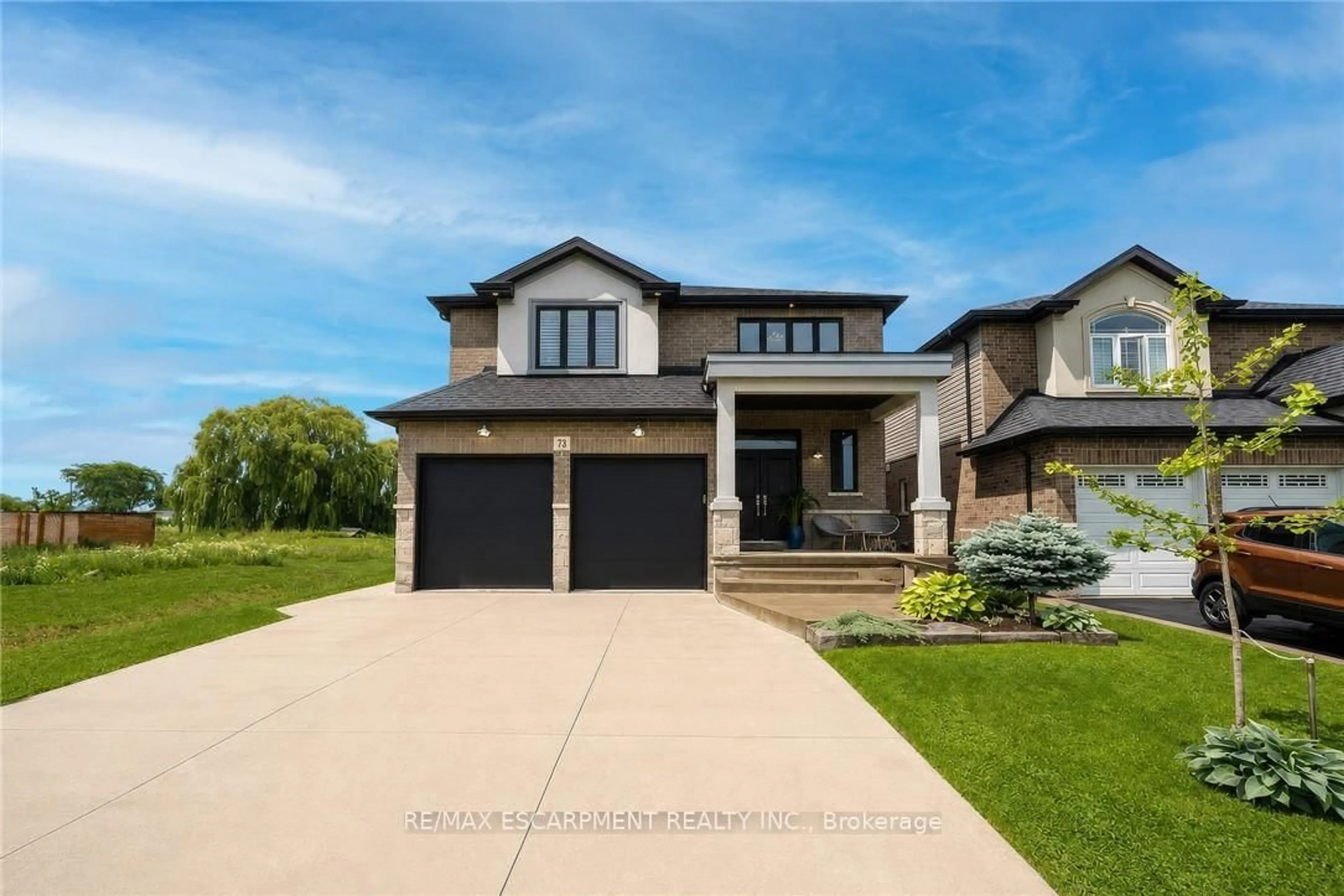 Home with brick exterior material, street for 73 Eleanor Ave, Hamilton Ontario L8W 1C8