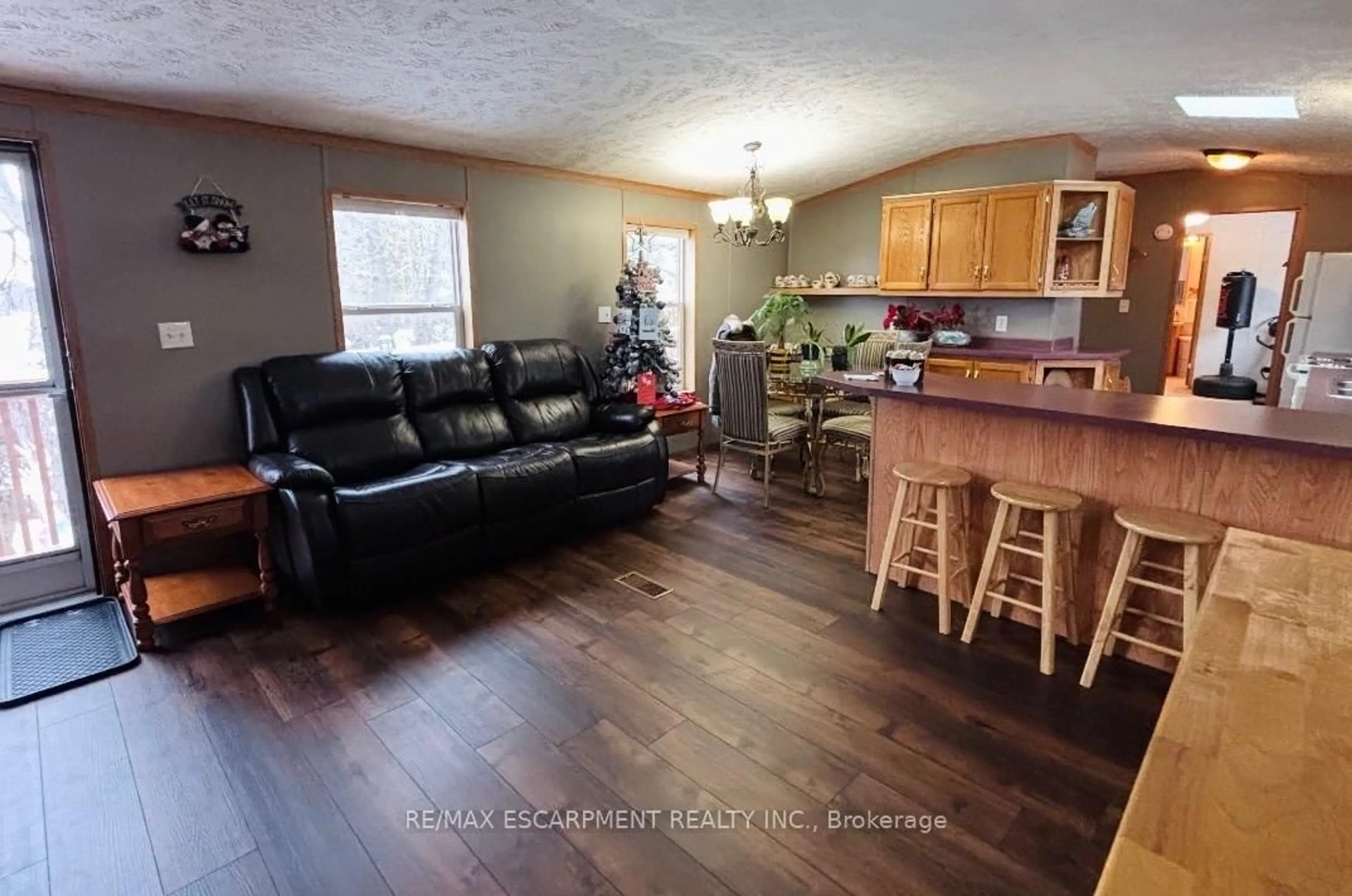 Open concept kitchen, wood/laminate floor for 1294 8th Concession Rd #31, Hamilton Ontario N0B 2J0