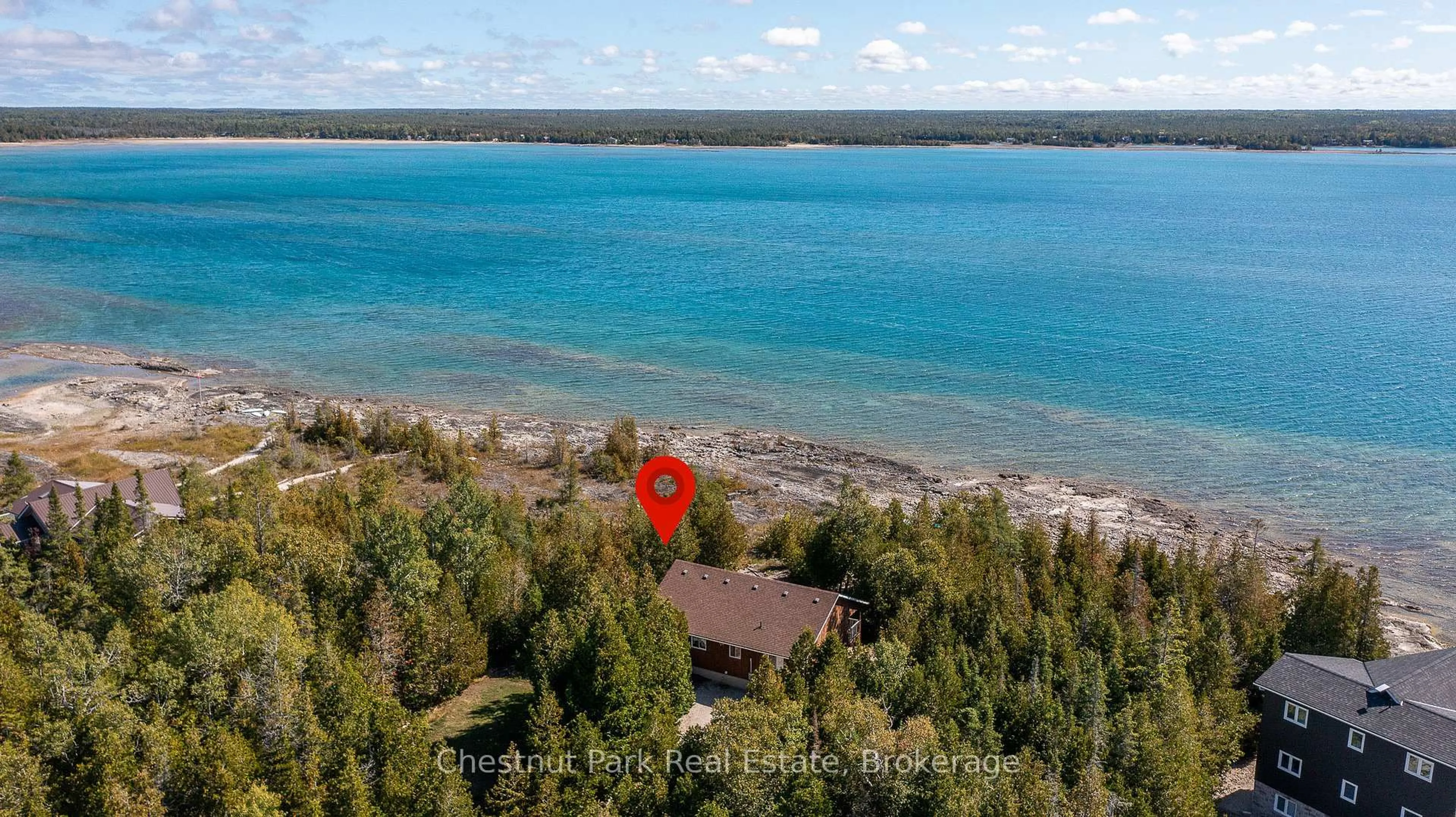A pic from outside/outdoor area/front of a property/back of a property/a pic from drone, water/lake/river/ocean view for 11 Eagle Rd, Northern Bruce Peninsula Ontario N0H 2R0