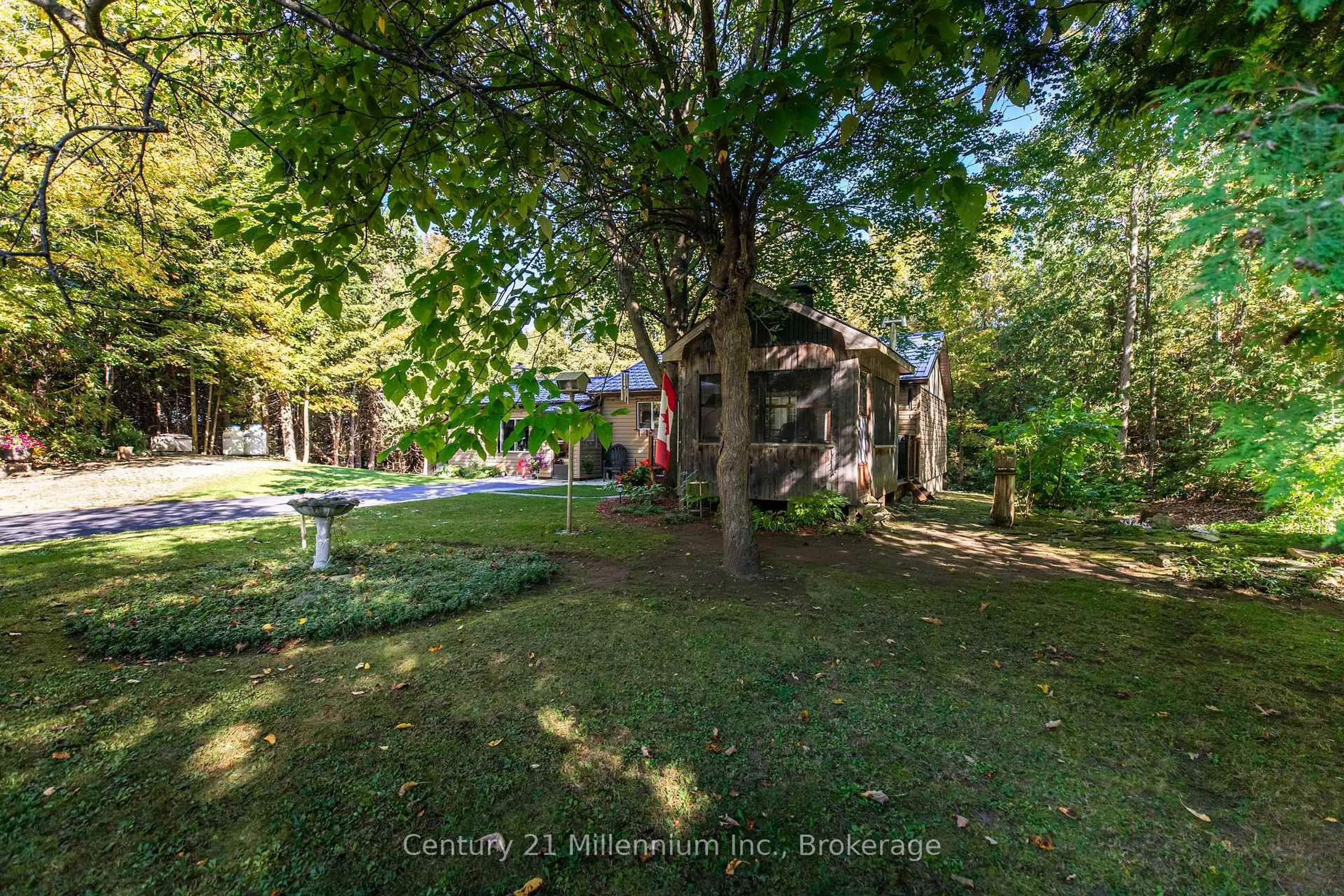 A pic from outside/outdoor area/front of a property/back of a property/a pic from drone, forest/trees view for 16 Fogden Cres, South Bruce Peninsula Ontario N0H 2T0
