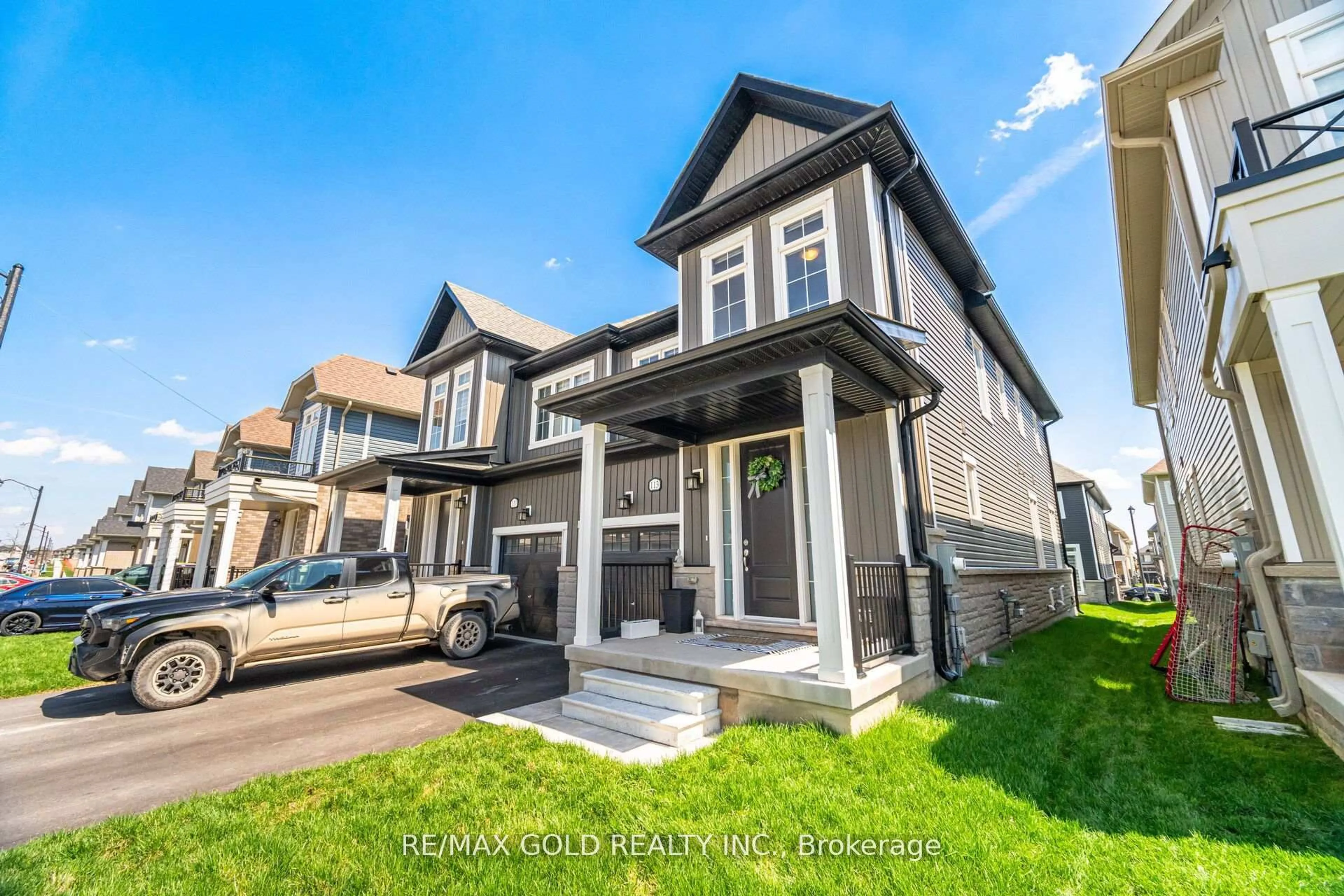 Home with vinyl exterior material, street for 113 Molozzi St, Erin Ontario N0B 1T0