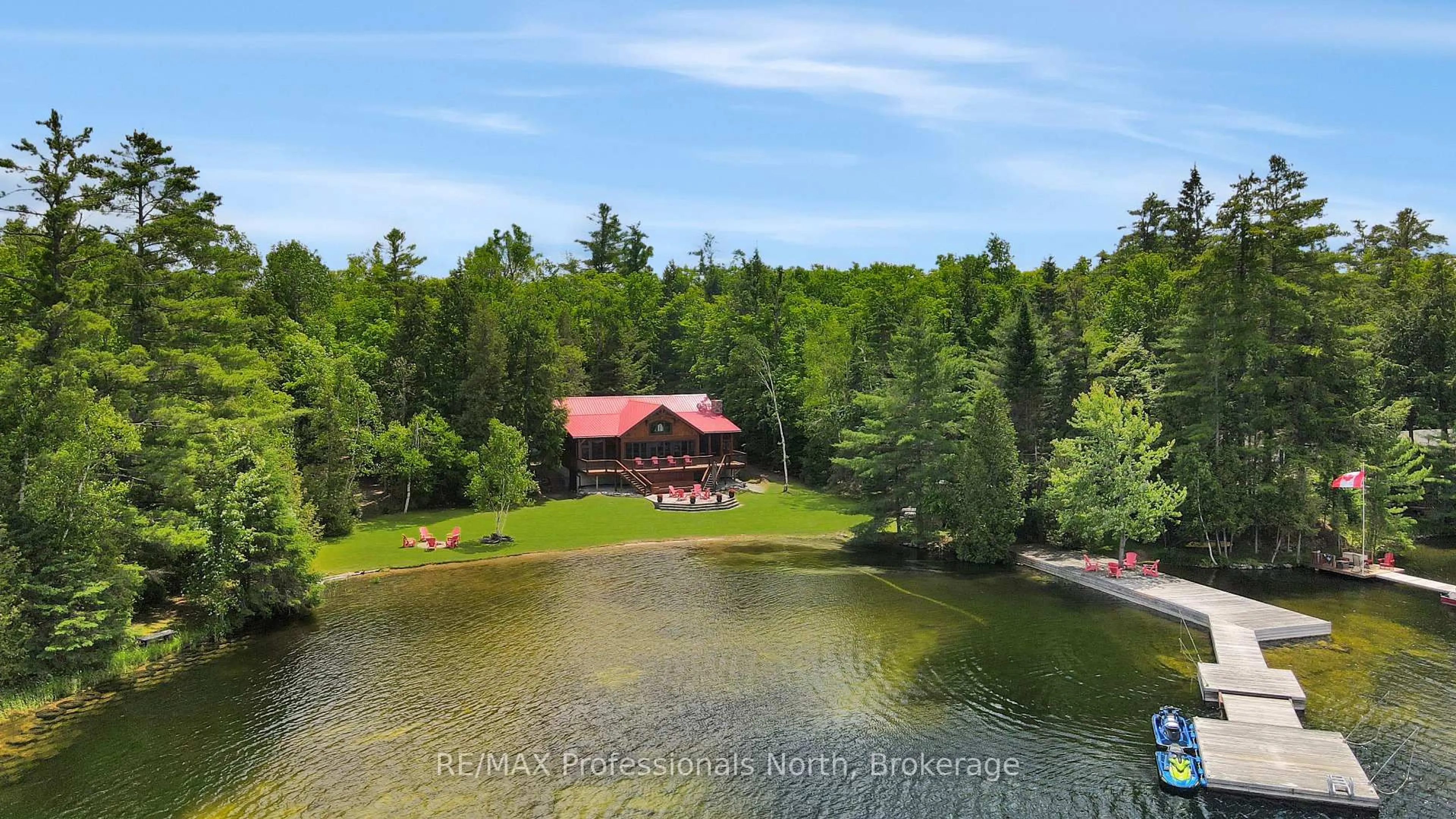 A pic from outside/outdoor area/front of a property/back of a property/a pic from drone, water/lake/river/ocean view for 334 East Clear Bay Rd, Trent Lakes Ontario K0M 2A0