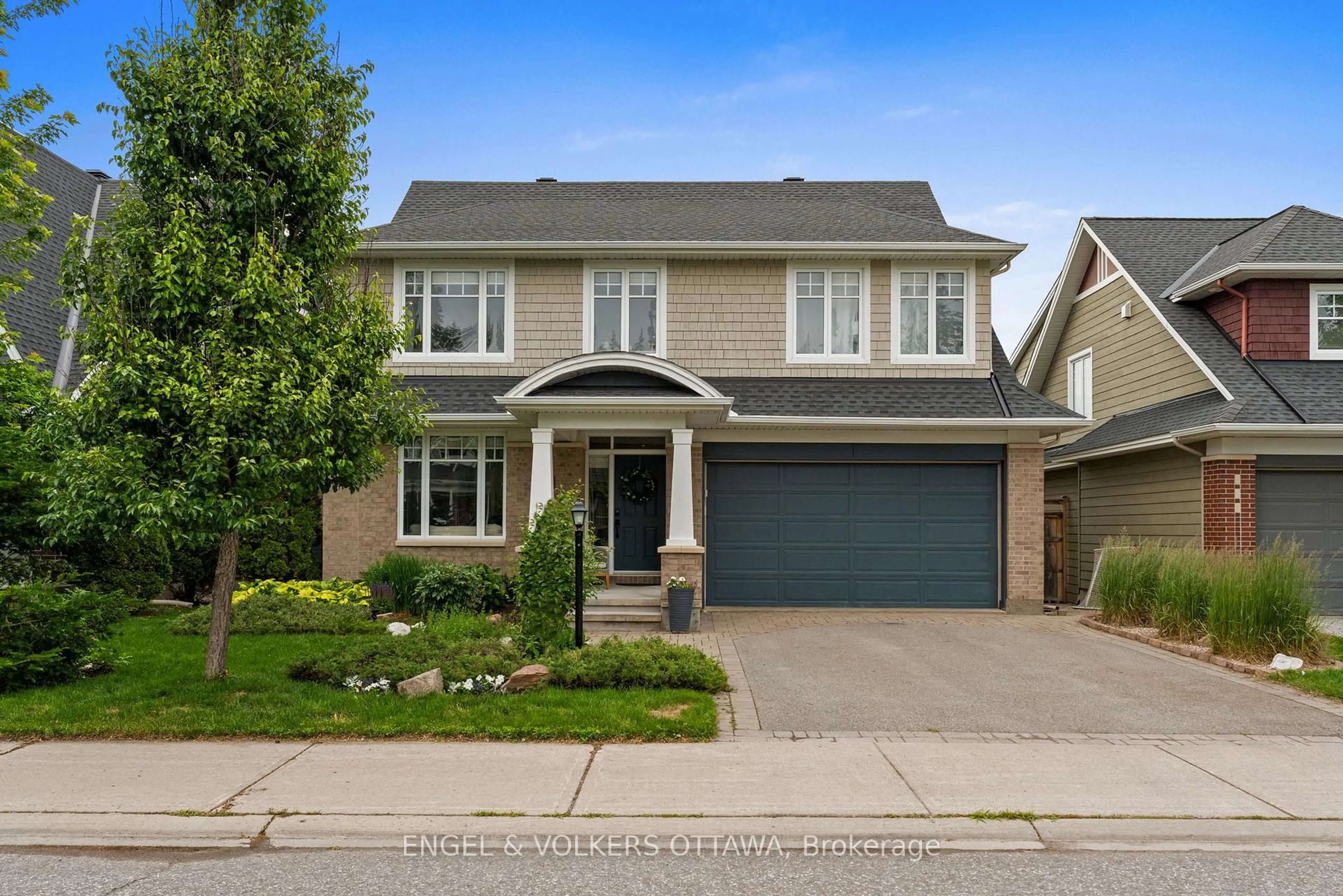 Home with brick exterior material, street for 564 Erinwoods Circ, Ottawa Ontario K2J 5M8