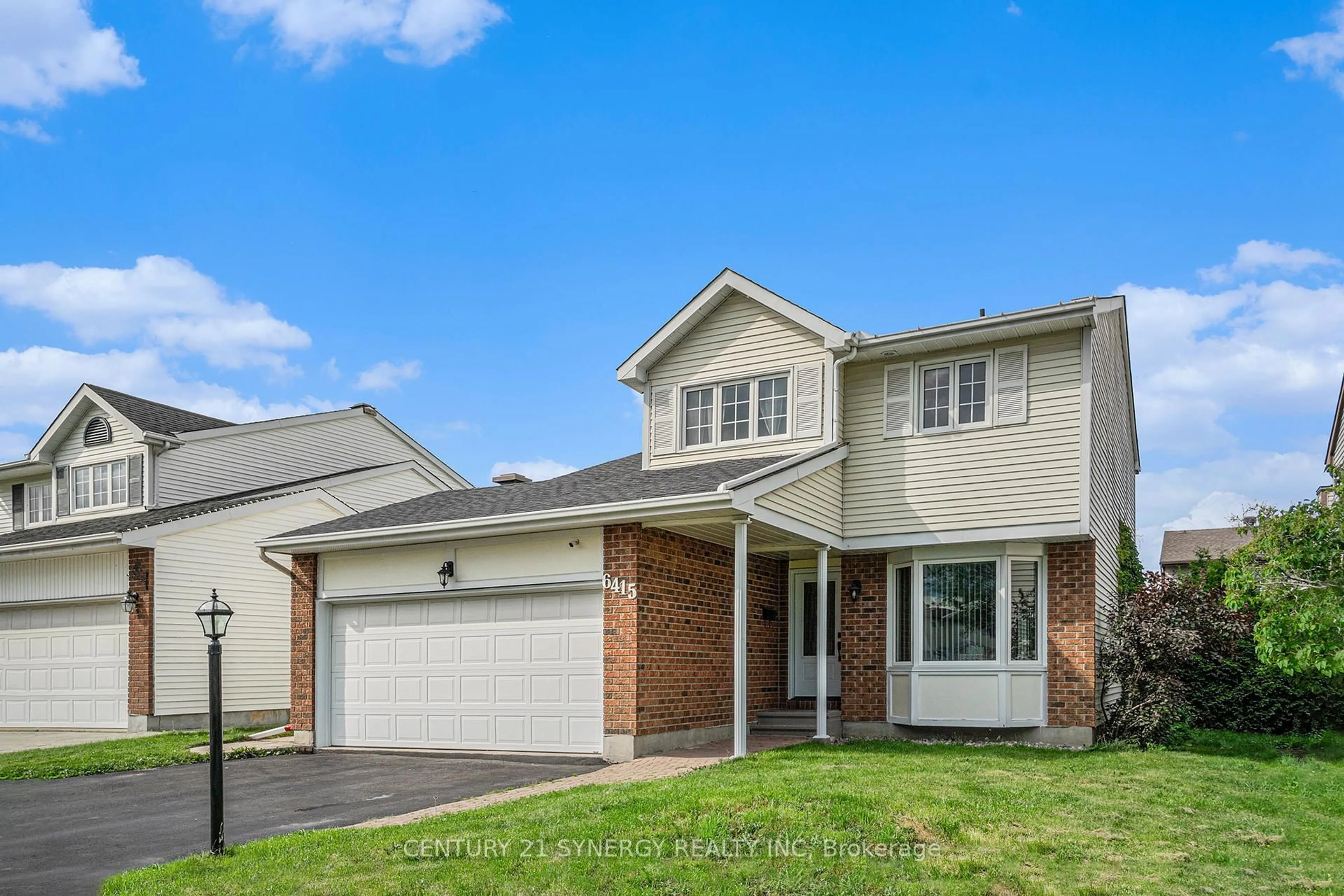 Home with vinyl exterior material, street for 6415 VISENEAU Dr, Ottawa Ontario K1C 5J2