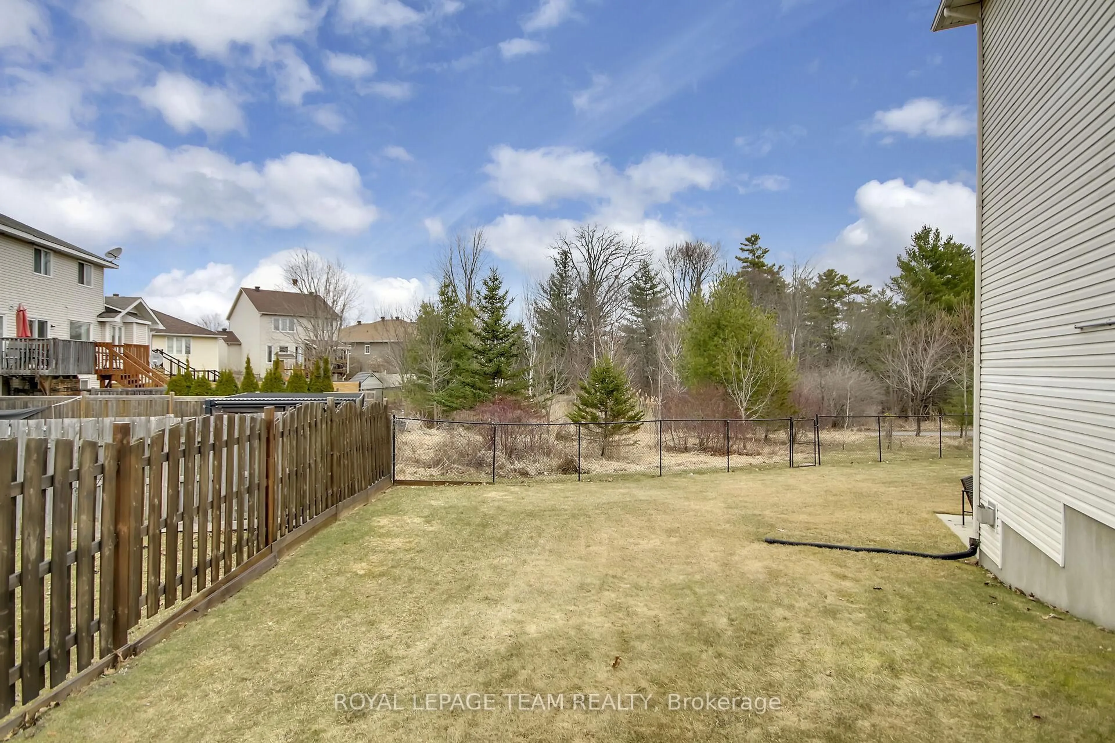A pic from outside/outdoor area/front of a property/back of a property/a pic from drone, forest/trees view for 2136 Bergamot Circ, Ottawa Ontario K4A 4R4