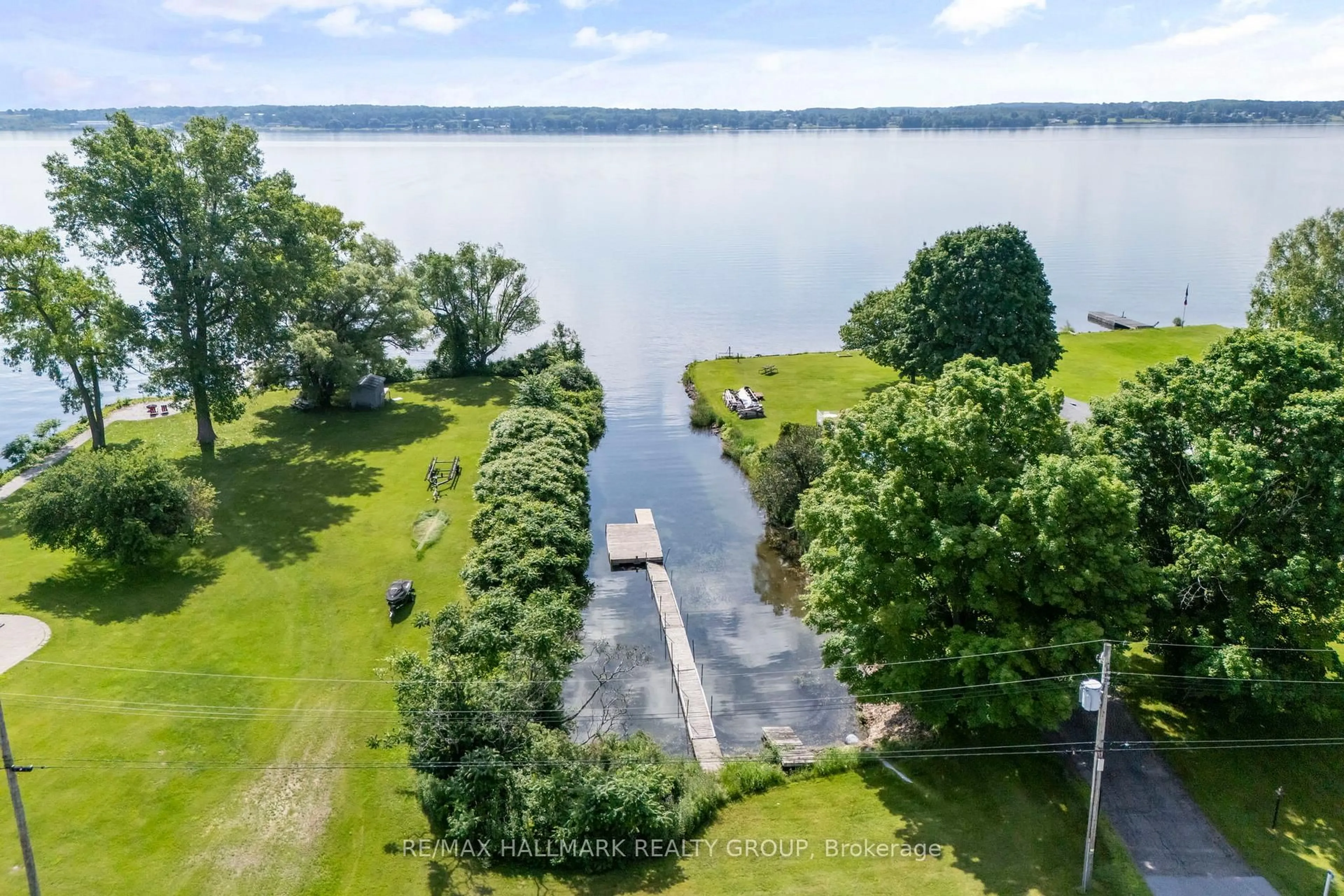 A pic from outside/outdoor area/front of a property/back of a property/a pic from drone, water/lake/river/ocean view for 22 St Lawrence Crt, Augusta Ontario K0E 1T0