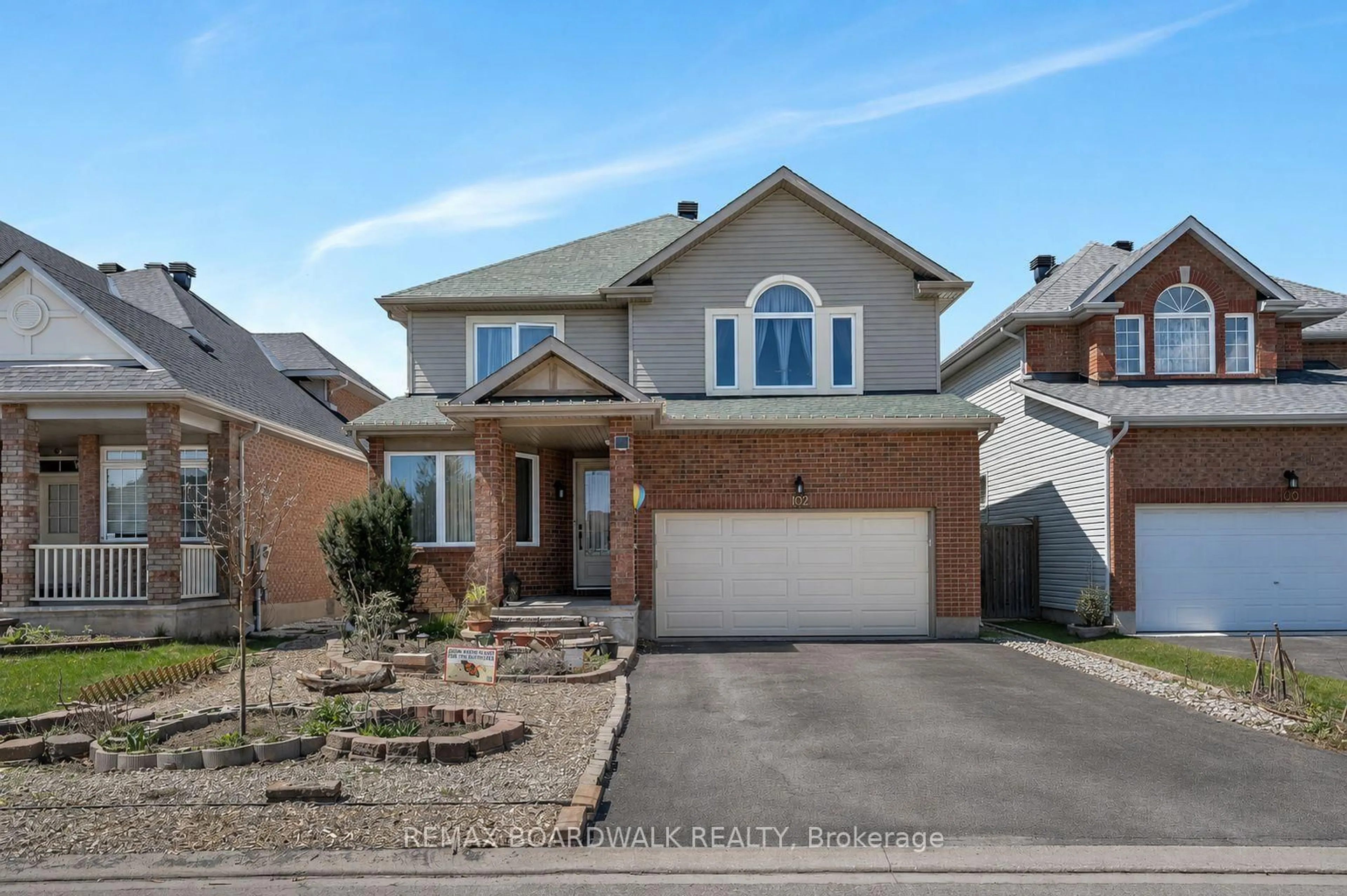 Home with brick exterior material, street for 102 Mosswood Crt, Ottawa Ontario K1V 0N6