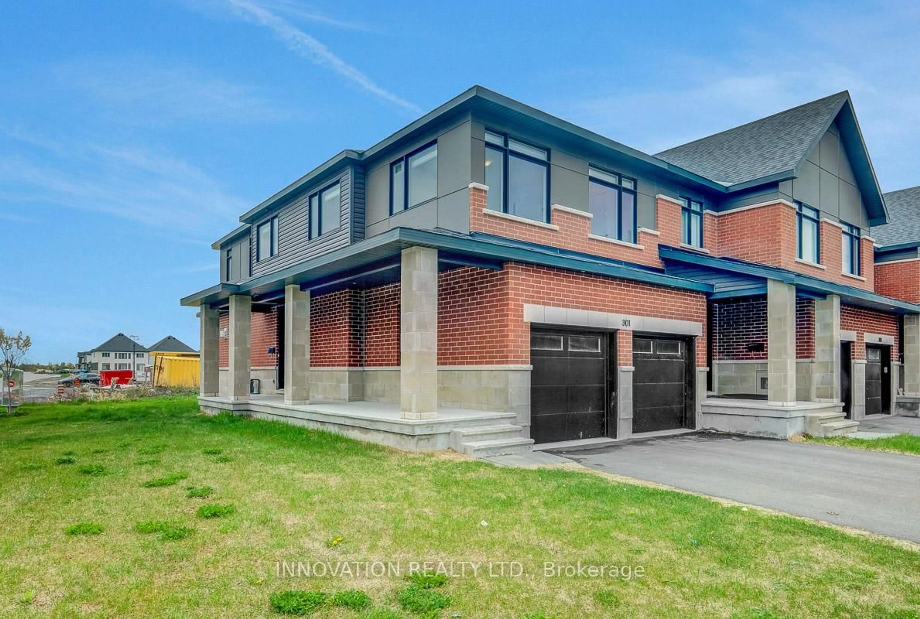 Home with brick exterior material, building for 301 Makobe Lane, Ottawa Ontario K4M 0L9