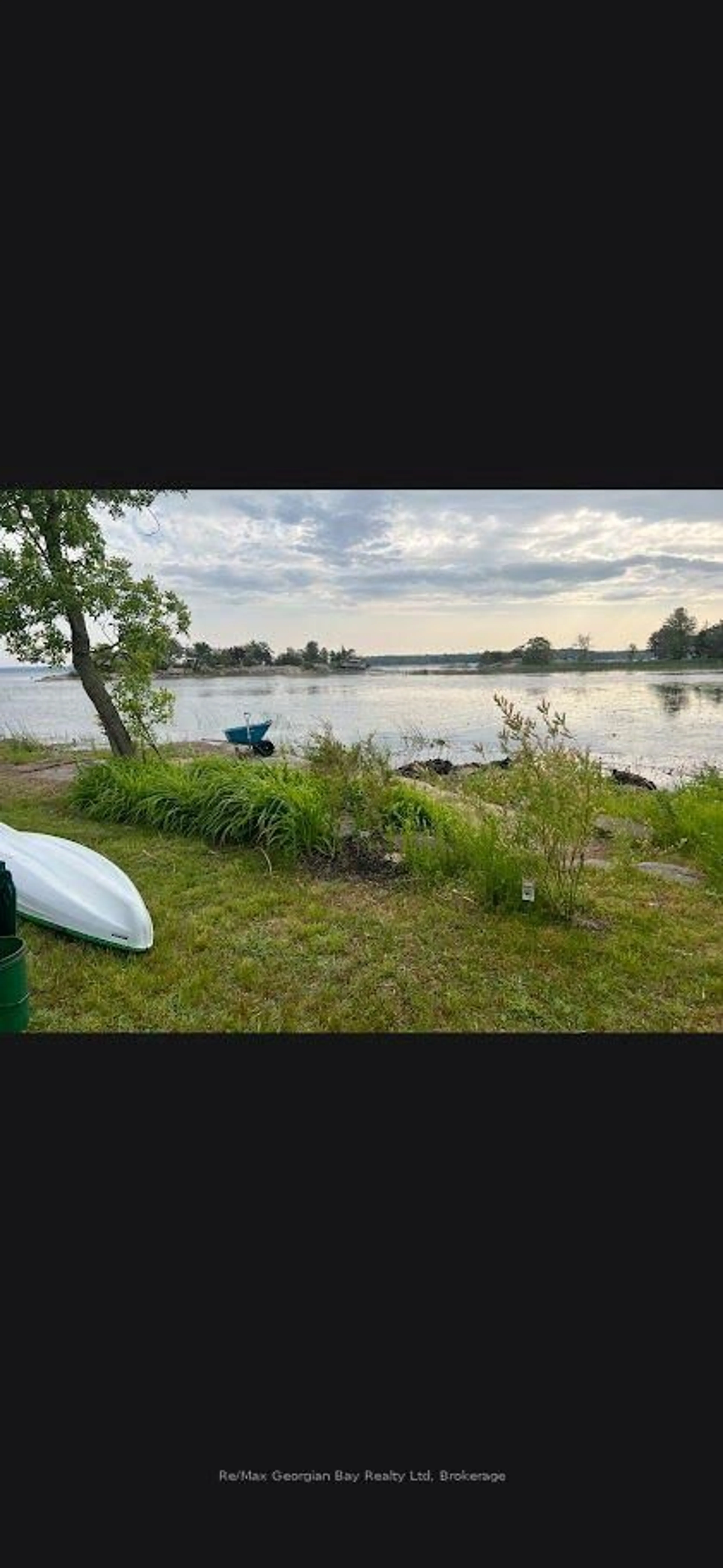 A pic from outside/outdoor area/front of a property/back of a property/a pic from drone, water/lake/river/ocean view for 380 2 Island, Georgian Bay Ontario L0K 1S0