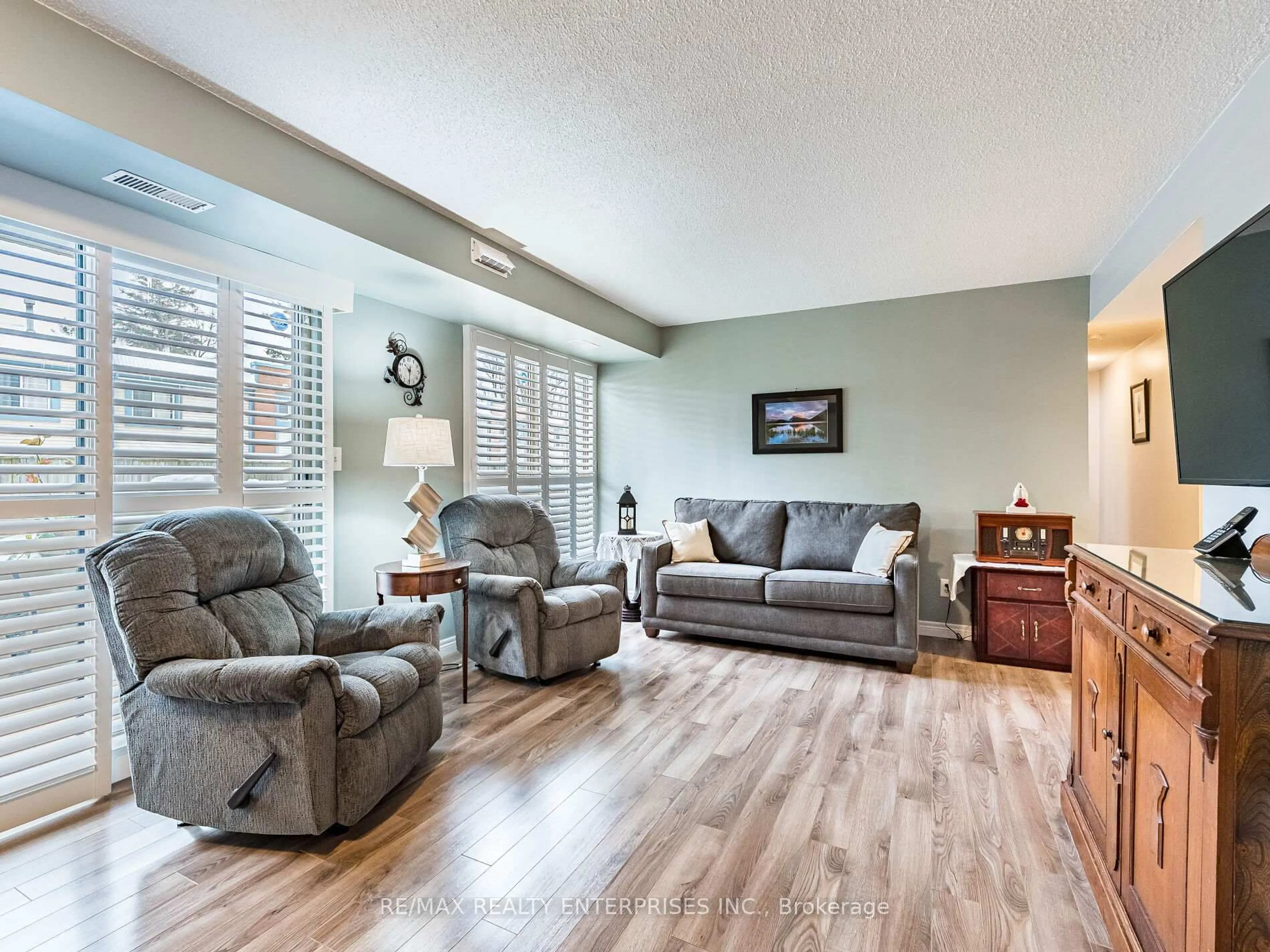 Living room with furniture, unknown for 3267 King St #105, Kitchener Ontario N2A 4A4