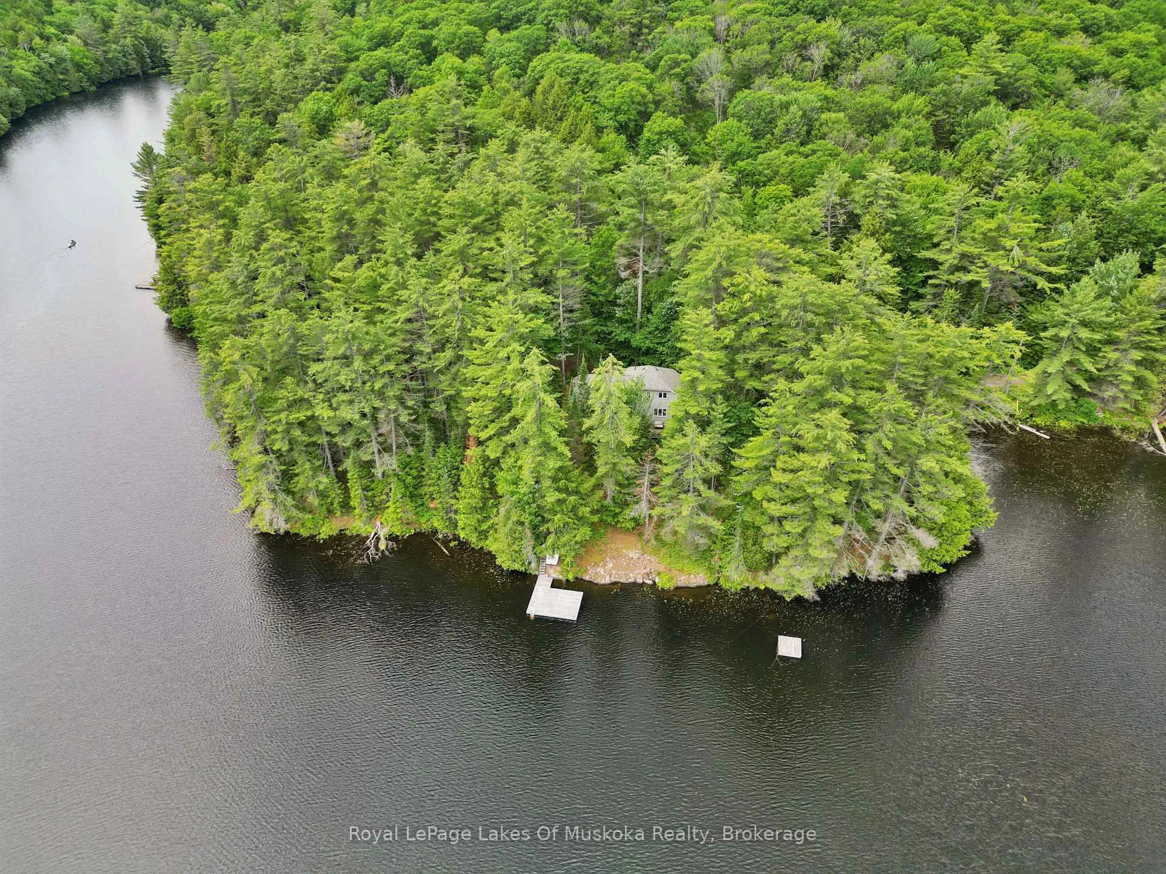 A pic from outside/outdoor area/front of a property/back of a property/a pic from drone, water/lake/river/ocean view for 1117 Craftsman Dr, Algonquin Highlands Ontario P0A 1E0